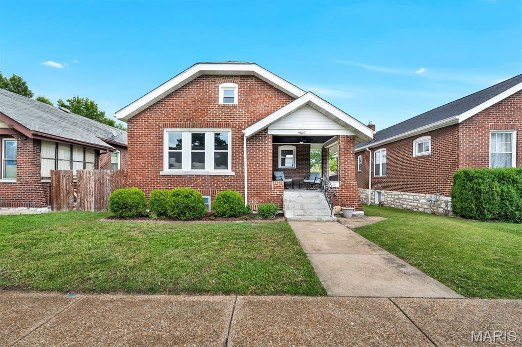 Welcome home to this charming and beautifully updated brick bungalow in the heart of South City! Conveniently located within walking distance to restaurants, schools, shopping, and parks, or enjoy a quick bike ride to the iconic Ted Drewes Frozen Custard.

This spacious home offers 4 bedrooms, 1.5 bathrooms, and a long list of recent updates, including a new roof, new windows, a stunning new kitchen, and updated bathrooms. The inviting covered front porch is the perfect place to enjoy your morning coffee, while the bright sunroom provides additional living space to relax year-round.

The full basement offers abundant storage and the potential to finish additional living space or add another bedroom. Outside, you'll appreciate the 2-car parking pad off the alley for convenient off-street parking.

Combining classic South City character with modern updates and an unbeatable location, this home is ready for its next owner to move right in and enjoy!