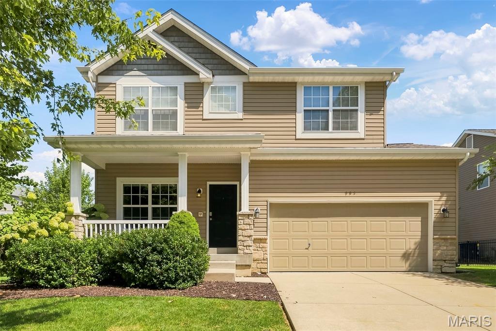 Welcome to 995 Harmony Lake Pkwy! This former display 2-story has so much to offer with 4 bedrooms, 3.5 baths, a loft, professionally finished lower level and a large, level fenced backyard. The main floor features 9' ceilings, engineered wood flooring, a family room with a gas fireplace, separate dining/living space and convenient main-floor laundry. The kitchen offers 42" cabinets, a pantry and a breakfast room overlooking the backyard. Upstairs you'll find 4 bedrooms plus a loft that makes a great additional sitting or flex space. The primary suite features 2 closets, a separate tub and shower and double-bowl vanity. The professionally finished lower level gives you even more living space with a family/rec room, egress window, full bath and an additional room that could be used as an office, workout room or hobby room. There's also plenty of unfinished storage. The backyard is a great feature of this home! It's large, level and fenced with dozens of trees, extensive landscaping, raised garden beds, a playset area with turf and edging, patio and in-ground irrigation system. The garage offers tons of additional storage with cabinets, wall storage, shelving and ceiling racks.  The sellers have made numerous improvements to the home including replacing the water heater, refrigerator, and dishwasher, adding a water softener and reverse-osmosis system, additional lighting, ceiling fans and interior painting September 2026. Enjoy everything Cottleville has to offer with its locally owned restaurants and shops, live music and community events and nearby community college.  Cottleville has that great small-town feel while still being convenient to Hwy 364, I-70, Mid Rivers Mall Drive, shopping and everyday conveniences.
