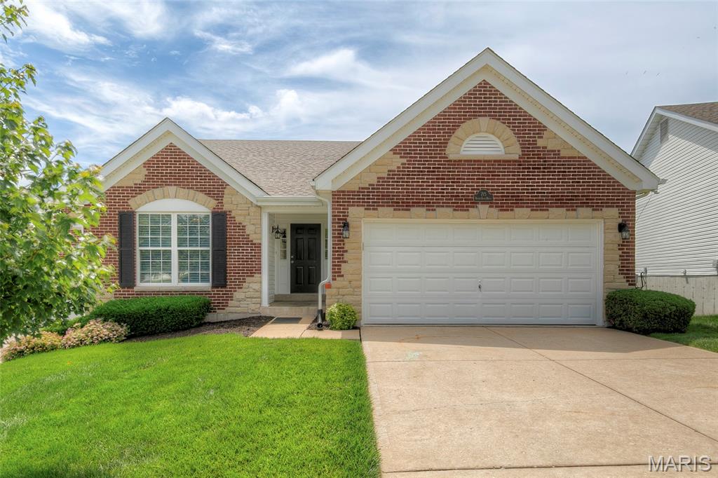 Home fire 3 years ago. Immaculate, like new luxury villa in perfect location near Hwy 40. Your new life starts with all new designer paint along with extremely tasteful flooring (luxury vinyl main level & carpeting in lower level). Towering vault, attractive quartz counter tops & gas fireplace. 3rd bedroom & full bath along with 2nd fireplace in lower level family room enclosed in the walkout basement. Outside there is a massive, low maintenance deck overlooking the pristine grounds. Roof, one year with furnace and A/C  just 3 years. Nothing to do but move! The monthly Association fees are very appealing at $195.00. All just waiting for you.