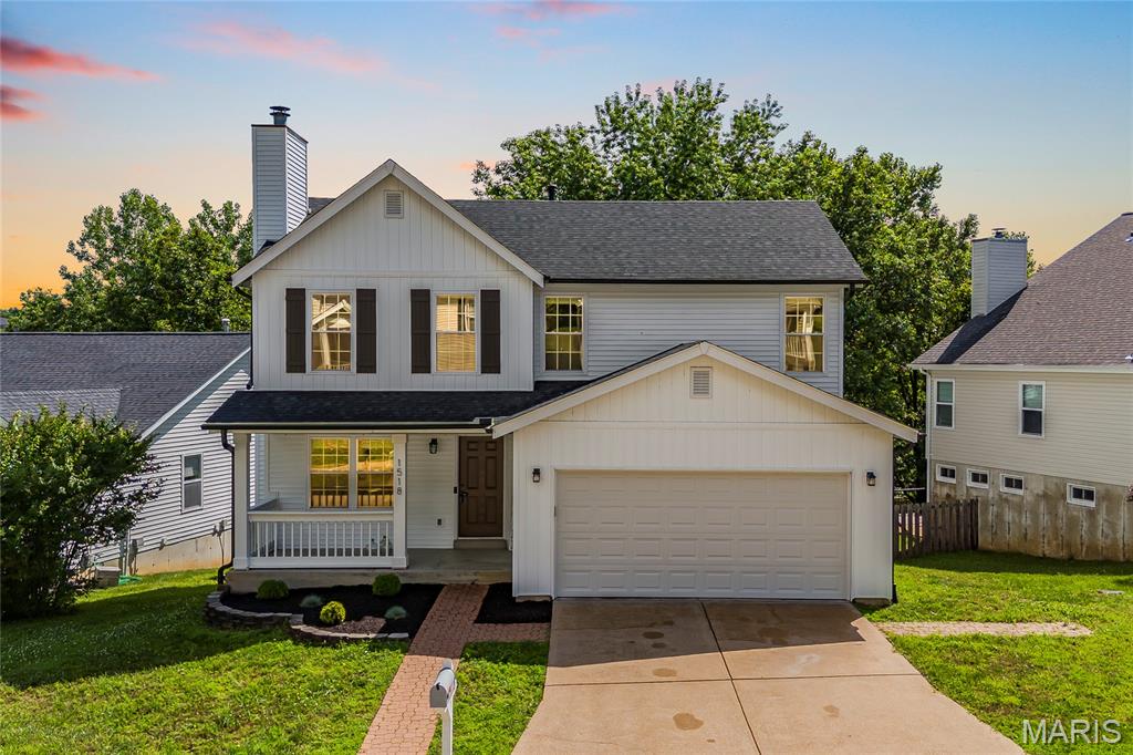 Welcome to this stunningly updated two-story home tucked away on a quiet cul-de-sac in the highly sought-after Parkway School District. Blending modern farmhouse-inspired design, functional living space, and truly turnkey updates, this 3-bedroom, 2.5-bath home with a 2-car garage offers the perfect combination of style, comfort, and peace of mind.

From the moment you arrive, the striking Craftsman-style exterior creates unforgettable curb appeal. Nearly every major exterior component has been recently replaced, including a NEW ROOF, GUTTERS, SIDING, WINDOWS, and GARAGE DOOR (2024–2025), along with a BRAND-NEW HVAC SYSTEM (2025), giving buyers confidence in both the beauty and durability of the home.

Inside, the bright and welcoming floor plan is designed for both everyday living and entertaining. The spacious family and dining room features a cozy gas fireplace, oversized picture windows, and abundant natural light throughout. The updated eat-in kitchen offers abundant cabinetry, hardwood floors, a large pantry, stainless steel appliances, and a portable center island for added flexibility and function.

Step outside to the expansive refreshed deck (2026) overlooking a private, fully fenced backyard that backs to mature trees - the perfect setting for morning coffee, outdoor dining, relaxing evenings, or entertaining guests. A convenient main-floor laundry room and powder room complete the main level.

Upstairs, the open and airy primary suite features vaulted ceilings, a walk-in closet, and a private ensuite bath with double sinks, a soaking tub, and separate shower. Two additional bedrooms and a full hall bath provide plenty of space for family, guests, or work-from-home needs.

The finished walk-out lower level adds exceptional versatility with a spacious recreation area ideal for movie nights, game days, or gatherings, plus a separate flex space perfect for a home office, gym, studio, or creative retreat. Walk-out access keeps the lower level bright and connected to the outdoors.

Located just minutes from major highways, top-rated shopping, dining, parks, and everyday conveniences, this move-in-ready home offers a rare opportunity to enjoy modern updates, timeless style, and an unbeatable location all in one.