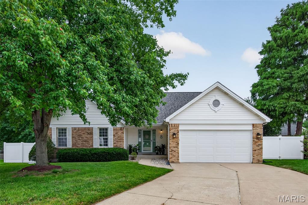 Some homes stand out because of their size. Others because of their location. 8 Lewis Ct starts with both—a quiet cul-de-sac setting, Laurel Park just down the street, and a layout designed for gathering, creating, and living well. Welcome to 8 Lewis Ct.
From the moment you step inside, the vaulted living room opens up above you, creating a light and easygoing space that invites you to slow down and stay awhile. Engineered hardwood flooring runs throughout most of the main level, adding warmth and character while connecting the open living, dining, and kitchen areas into one effortless gathering space.
The heart of the home is the kitchen, where there's plenty of countertop space for everything from Sunday meal prep to charcuterie boards with friends. A pantry keeps life organized, and the open layout means no one gets left out of the conversation.
Thoughtfully designed for everyday comfort, the main level offers three bedrooms, a full hall bathroom, and a private primary suite with its own ensuite bathroom which includes a separate shower and soaking tub. Main-floor laundry adds another layer of convenience, creating a layout that simply works for the way people live.
The finished lower level brings even more flexibility to the home, with a large family room that's ready for everything from movie nights and gaming sessions to lazy Sunday afternoons. Cozy carpeting helps create an inviting retreat, while the bonus sleeping room with vinyl plank flooring can easily adapt as a guest space, office, studio, or workout room. A convenient half bath means fewer trips upstairs, and two unfinished storage rooms offer the kind of practical space that's increasingly hard to find.
Out back, you'll find a spacious, fully fenced yard surrounded by a newer low-maintenance 6-foot vinyl fence, creating a backdrop for whatever lifestyle you envision. Whether that means gardening, hosting summer cookouts, gathering around a firepit with friends, giving pets room to roam, setting up a play area, or simply enjoying a quiet cup of coffee outdoors, there's plenty of space to make it your own.
The updates are already handled, too, with a new roof in 2024, newer A/C, water heater, and garage door, giving you more time to enjoy the home and less time worrying about big-ticket maintenance.
Located in the sought-after Francis Howell School District and served by the new Francis Howell North High School, this home also offers quick access to Highway 94, 364, and I-70, making it easy to get wherever life takes you.
Whether you're a first-time buyer looking for a place with personality, a move-up buyer craving more room to live and create, or someone ready to downsize without giving up comfort and community, 8 Lewis Ct offers that rare combination of practicality, warmth, and good energy.
Some homes check boxes. This one feels like the start of a really good chapter.
