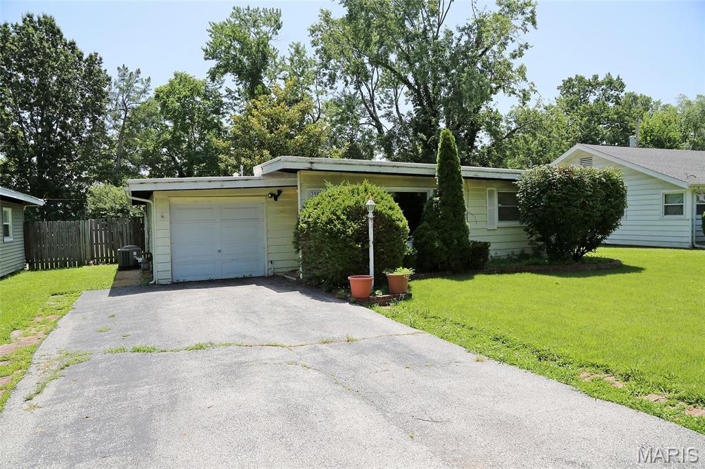 Investor special for homeowner or investor. Not much to be done! Property being sold as is Property has had updates in last ten years to the kitchen cabinets and countertop, microwave, laminate flooring, central air, furnace, bathroom with tile work and shower tower panel, newer windows Main floor laundry. All appliances stay. Won't take much! Attached garage nice fenced yard. Easy location to Highway 170 to Airport or Clayton!