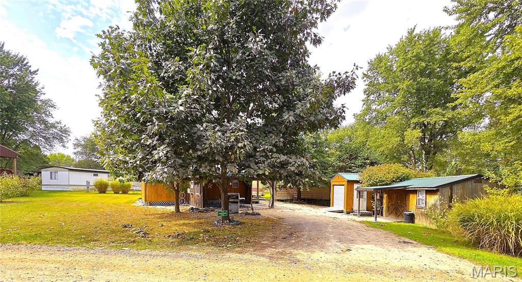 Sorry this property can NOT be used as a rental/investment property, air b and b, etc as the community is a private community for owner users only.

Wonderful recreational property opportunity in Gascony Village!!  This property includes THREE lots, 1 is clear and can fit a camper, the other 2 include one main cabin and 2 additional outer buildings/ dry cabins!!!  Grab your jetboat, jet ski, camper or 4 wheeler and come enjoy life!

Cabin 1 is a fabulous 3 season well insulated 2 room cabin featuring a large bedroom/bathroom/closet area and then the other side of the cabin is huge kitchen with beautiful custom cabinets and laundry room/pantry.  The main cabin has a wonderful covered porch to enjoy rain or shine! 16x36 cabin.

Cabin 2 is a dry sleeping cabin, complete with bed, tv table etc.  Great for the kids, grandkids, guests, or can even be made into another main cabin or even a "man cave or she shed"! 12x20

Cabin 3 is currently used as a garage and shop, but has electric doors and windows so it can be anything you want it to be!  12 x 18

Additional lot where you could park a camper or boat next to the cabins! 

Furniture stays if buyer wants it.

This property is in the Gascony Village community, which is a private recreation community with private access to the Gasconade River!  There's a beach and boat ramp, a huge pool with both shallow and deep ends, volley ball court, fishing lake, clubhouse, playgrounds, etc.  All within walking distance or a 4 wheel ride on private roads!  Such a fun community with tons of fun events, located about 15 minutes from downtown Hermann and 7 minutes to the closest winery!

Please be advised that this is currently a 3 season property that the owners winterize for the cold months.  If someone wanted to live here full time they would have to figure out a way to keep the pipes from freezing in the winter and get a better heat source.