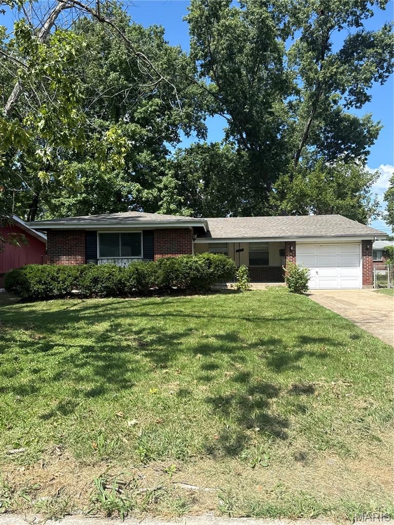Check out this wonderful investment opportunity to add to your real estate portfolio! This charmer is a 3 bedroom; 2 bathroom; one-car garage, fenced in backyard, all brick exterior single family home that sits in the heart of North St. Louis County. Contains the original hardwood floors, freshly painted all neutral colors, original kitchen, the hall bathroom was fully remodeled, finished basement. Systems are older, but are in good operable condition. Rental comps in the area are approx. $1,400/month. Call today to setup a showing!