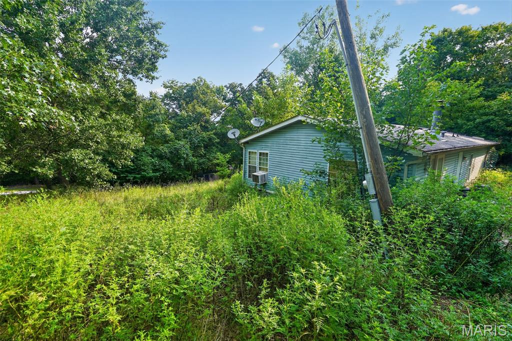 Discover an exciting opportunity at 2960 Windy Hill RD, Festus  MO 63028. This single family residence, built in 2017, presents a compelling proposition for investors and handy homeowners alike, offering significant potential to personalize and enhance. The heart of this home features a kitchen designed for both culinary creativity and casual gatherings, complete with a functional island. Refresh and rejuvenate in the bathroom, which includes a luxurious jetted bathtub, providing a private sanctuary for relaxation. With three bedrooms and two bathrooms, this property is a canvas awaiting your vision. Inquire today to explore the possibilities this investment property holds.