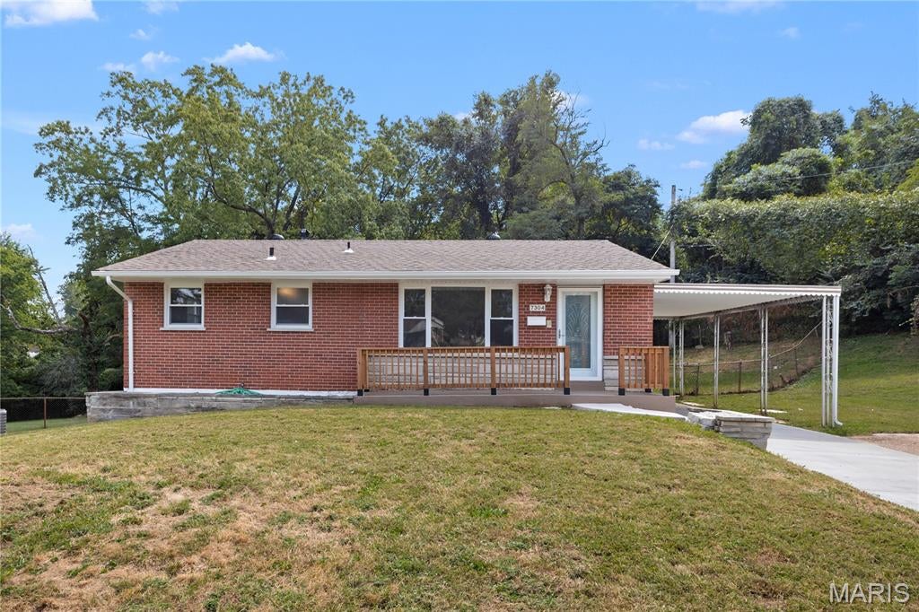 Welcome Home to this charming ALL-BRICK 3-bedroom, 1-bath ranch nestled on a quiet cul-de-sac in the Sheppard Hills subdivision of Jennings! Offering over 1,600 sq. ft. of livable space, tremendous curb appeal, a 1-car garage, carport, and an oversized driveway, this move-in-ready home delivers incredible value at just $134,900! Notable updates include a NEW ROOF, NEW GUTTERS, NEW WINDOWS, NEW CONCRETE DRIVEWAY and beautifully refinished hardwood floors! Step inside to discover a gorgeous updated kitchen featuring granite countertops and stainless steel appliances, a stylish bathroom with ceramic tile tub surround, and three generously sized bedrooms completing the main level. The finished lower level provides two spacious recreation areas, a bonus room, laundry/utility area, and plenty of additional storage. Outside, enjoy a large fenced backyard and nice-sized patio—perfect for entertaining, family gatherings, or simply relaxing. Conveniently located just minutes from I-70, parks, shopping, public transportation, and St. Louis Lambert International Airport. With this much space, these major updates, and a price of just $134,900, this home offers tremendous value. Don't miss your opportunity to make it yours!