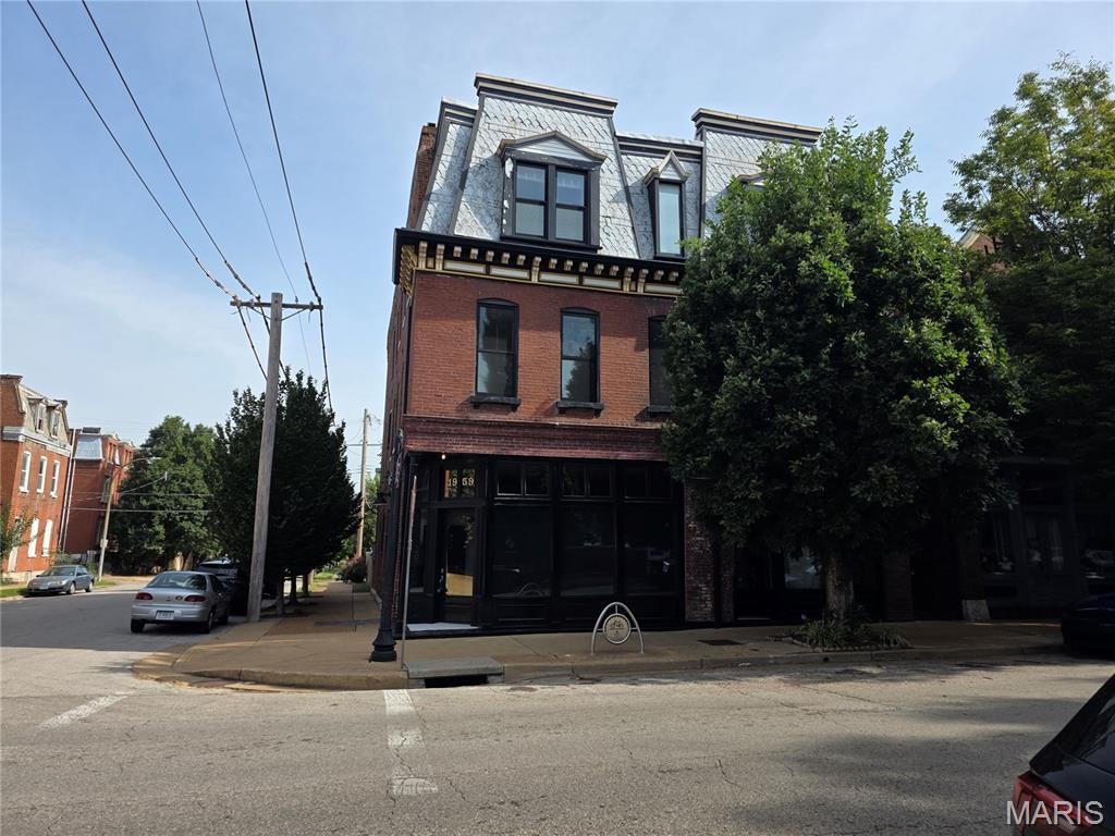 Available now on the vibrant Cherokee Street corridor — a beautifully restored 1,300 sq ft space perfect for a hair salon or barbershop. This turnkey unit already features multiple shampoo/backwash stations, saving a new tenant thousands in buildout costs. Enjoy soaring ceilings with a striking black accent ceiling and designer light fixtures, refinished hardwood floors, and exposed brick walls full of character. Oversized historic storefront windows offer great natural light and street visibility, while original woodwork, a charming Dutch door, and mosaic tile entry preserve the building's historic charm. A break room with cabinetry, sink, mini fridge, and water dispenser rounds out the space. The open, flexible layout easily accommodates multiple stations or private rooms. Cherokee Street is one of St. Louis's most walkable, fastest-growing commercial corridors. Contact us today to schedule a tour!
