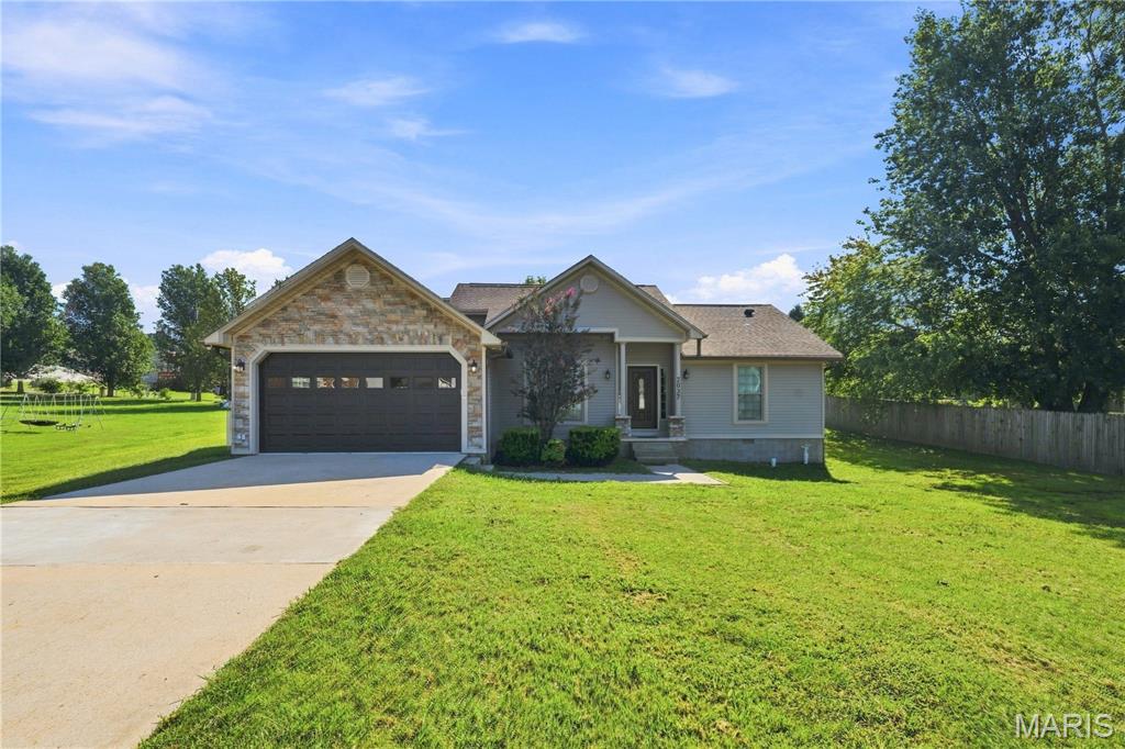 Located in the desirable Still Creek Crossing is a 3 bedroom, 2-bath home featuring vinyl siding and stone accents. Home comes with an open floor plan, tall ceilings, custom kitchen w/ granite countertops, and rounded archways. Extra large master suite has trey ceilings, walk-in closet, double vanity, and walk-in tile shower! The best part is you get to enjoy your spare time on a spacious open deck. Call today to schedule your showing!