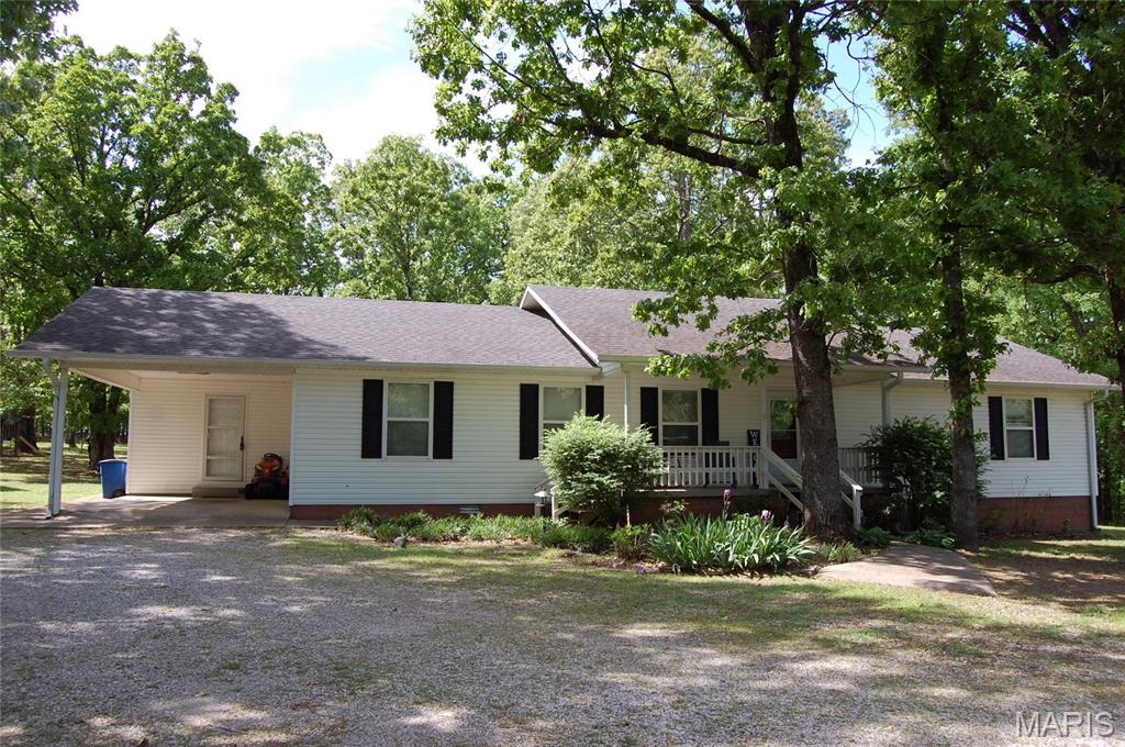 Beautiful, clean, move-in-ready 4-bedroom, 2 bath home with open concept, vaulted ceiling, spacious kitchen with pantry, mudroom, and carport.  Front porch and open deck in the backyard. Also has a 12x16 storage shed and a large level lot at the end of the road. Close to town, shopping, Copper Top, and doctors. The playset does not stay. Better grab this one before it's gone!