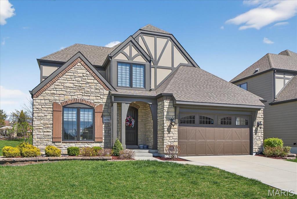 Beautifully designed story-and-a-half home offering the perfect blend of comfort, style, and ease. The open floor plan is ideal for everyday living and entertaining. Rich hardwood floors run throughout the main level, complemented by a light-filled great room that flows easily into the breakfast room and stunning kitchen. The kitchen features an oversized center island, designer cabinetry, and quartz countertops.
The main floor primary suite provides a private, peaceful retreat with a spacious walk-in closet and a luxurious bath complete with a freestanding tub and walk-in shower.
Upstairs, two generously sized bedrooms each offer their own en-suite baths, creating comfortable and private spaces for family or guests. The finished lower level expands the living space with a family room, an additional bedroom, and a full bath, perfect for hosting or relaxing.
Lawn care, landscaping, irrigation, and snow removal are included in monthly HOA, offering added convenience. Ideally located near shopping, dining, and major highways, this move-in ready home offers a simplified lifestyle in a fantastic location.