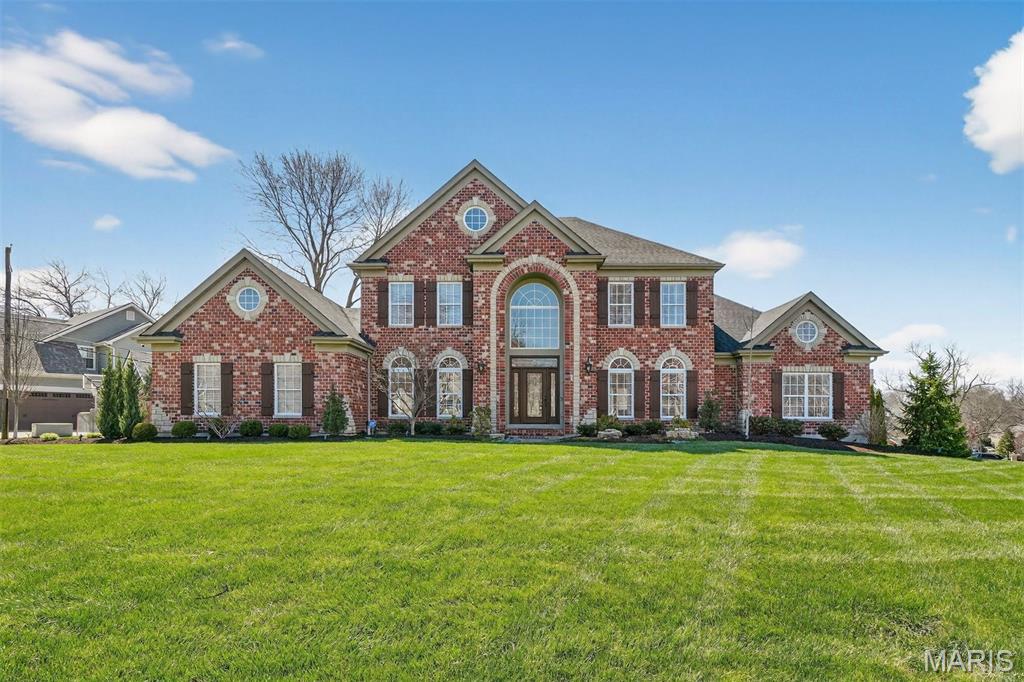Presenting an exceptional five-bedroom residence in the highly coveted Harwood Hills neighborhood, thoughtfully designed with a main-level Primary suite and an elegant, open-concept floor plan ideal for both refined living and effortless entertaining. The gourmet kitchen is a standout feature, boasting three expansive islands that provide both function and style, perfect for culinary pursuits and gathering alike.
Upstairs, four well-appointed bedrooms are complemented by two full baths, offering comfort and privacy. The luxurious Primary bath serves as a serene, spa-inspired retreat, enhancing the home’s warm yet sophisticated ambiance throughout.
The finished lower level spans approximately 2,000 square feet and is designed for leisure and entertaining, featuring areas for billiards and table tennis, a media lounge, and a stylish bar. An additional bedroom or private office, along with a full bath, adds versatility. Outdoors, enjoy beautifully refreshed landscaping, a fenced yard, and an inviting patio with a gas fireplace. A charming built-in shed with electricity offers unique potential as a studio or enchanting playhouse.  Close to all that Kirkwood has to offer.
