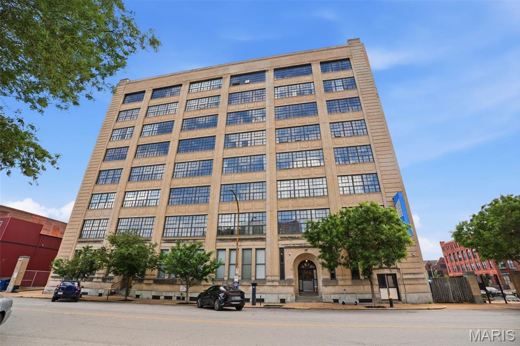 This light-filled, open-concept space featuring 1 bedroom and 2 full baths, at The Lofts at 2020 Washington, blends historic character with modern updates, featuring warm floors, classic exposed brick, and expansive windows that flood the loft with natural light. The spacious living room with custom built-ins flows seamlessly into the dining area and updated kitchen, creating the perfect layout for entertaining. The kitchen combines style and function, while recent upgrades include a new microwave & disposal. A generously sized bedroom and two full baths offer comfort and convenience, with added shower lighting for a modern touch. Even better, all appliances stay, including the washer and dryer...plus the Trane HVAC is new (2025).Enjoy secure parking with one assigned lot space and take advantage of the rooftop gathering area overlooking Energizer Park, home of St. Louis CITY SC. Located in the heart of Downtown West, you’re within walking distance to restaurants, entertainment, and major downtown attractions, with quick highway access for an easy commute. No short-term rentals allowed. Key fob entry. Style, comfort, history, and location — this loft delivers it all. Schedule a showing today.