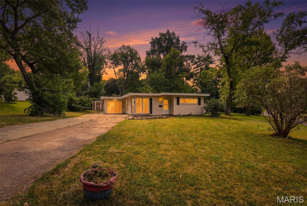 Take a look at this fantastic opportunity for an Owner Occupant or for your Investment Portfolio! Charming 2 bedroom ( possible 3rd bedroom /bonus room easily could be converted to a 3rd bedroom suite), 1 Full Bath home with an extended parking pad,  all on a large corner lot next to St Ferdinand Park. This home boasts an open airy floor plan perfect for entertaining or relaxing with family/friends. The kitchen is open to the 2 family rooms and offers ample counter space, wood cabinets and newer stainless steel appliances (Washer/Dryer and Fridge) ; which will ALL stay with sale of home! There are two family rooms for the family to spread out, a wood burning fireplace, and Georges floor to ceiling windows in the front room to let the natural light in. The fenced in back yard is HUGE with plenty of room for the dog and kids and family cookouts and don’t forget the large storage shed to keep all the essentials. The seller has already taken care of the major things for you like Water Heater, HVAC (Furnace and Ac unit ) all 3yr old and the Roof 2yrs old. All this with a convenient location to shops and right off of Hwy 67 in Florissant! Priced to sell! Home being sold AS IS.