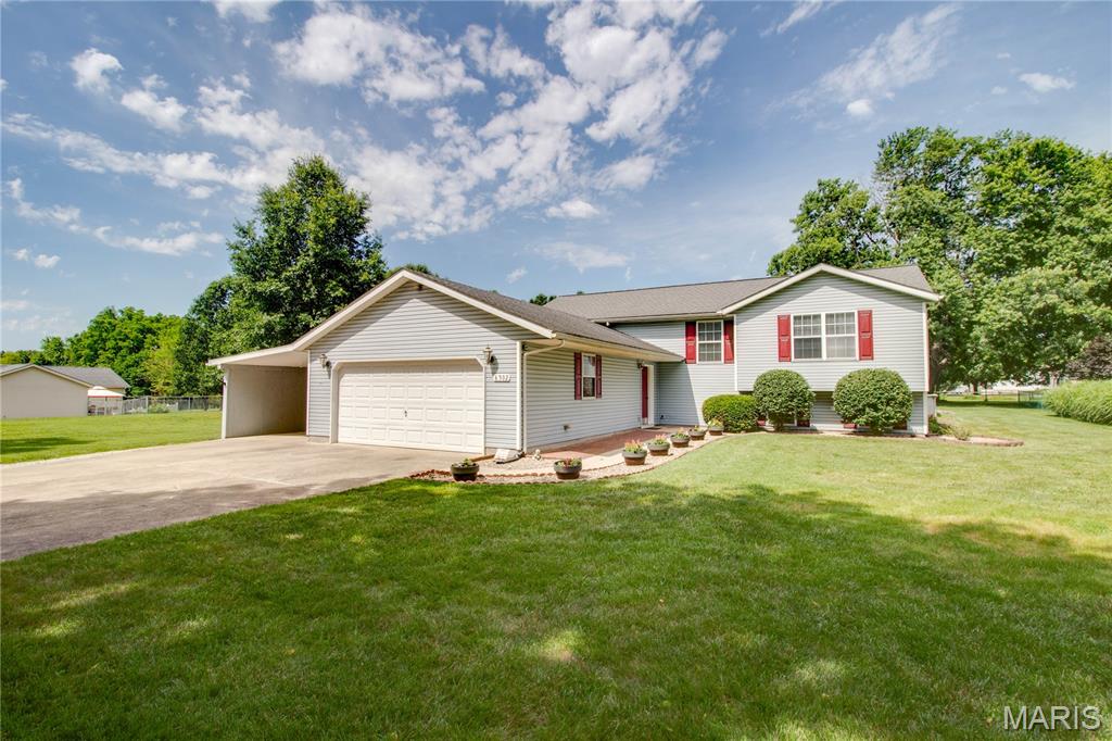 Check out this amazing home situated on a double lot (approx 3/4 acres+/-). Very well maintained and a beautiful setting. Enjoy the above ground pool with two- tier deck. New pool liner, beaded edge, pool liner pad, filter, pump, solar cover, winter cover, and ladder in 2026. Roof was replaced in 2018. Hardwood floors in living/dining rooms. Primary suite features a walk in closet and a whirlpool tub and separate shower. New LVP flooring in the lower level (2025). Water heater replaced in 2017. Plenty of garage space (483sq ft) with additional workshop and carport (384 sq ft). 16 x24 shed with electric.  Norweco septic with new pump 2020 and last pumped 2025. 
All offers to be submitted by Friday June26 10 am