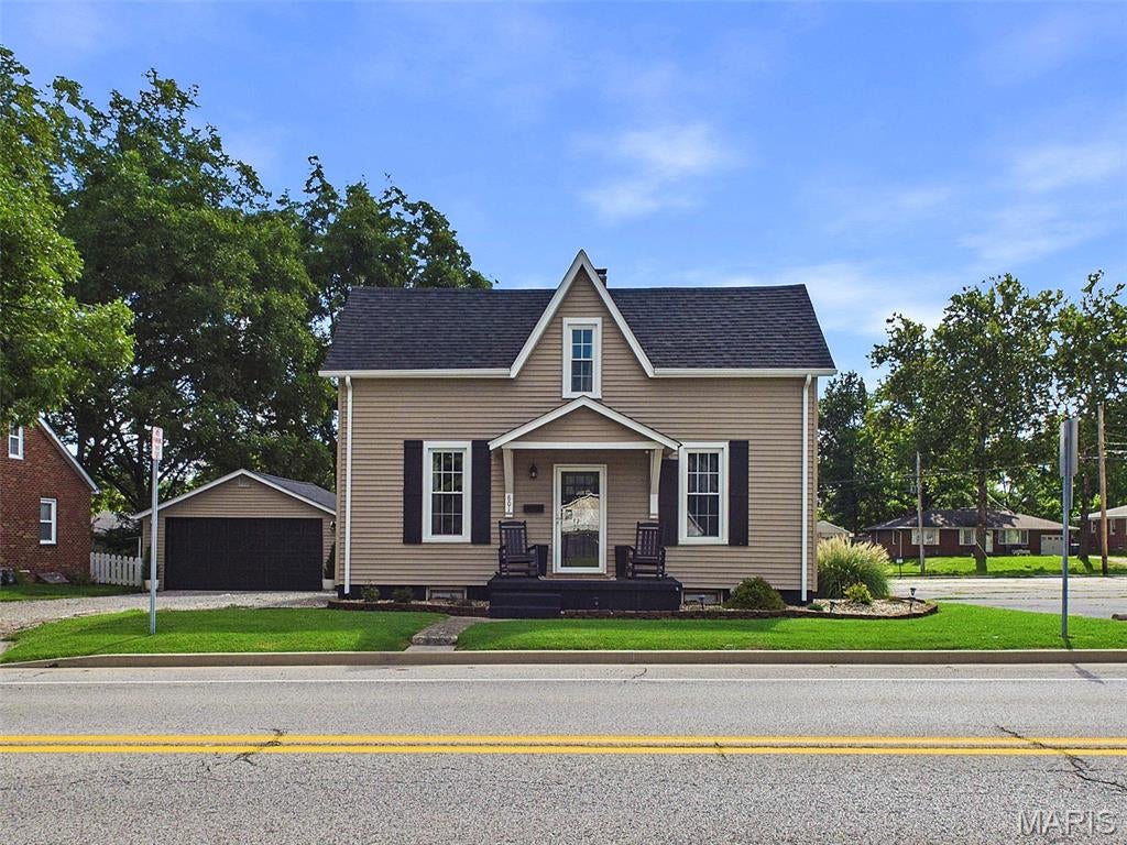 Welcome to 801 Poplar Street in Highland, Illinois! This well-maintained home has been completely updated inside and out, making it a great option for anyone looking for a move-in-ready property. The interior was fully renovated in 2023 and offers a spacious layout with 2 bedrooms and 1.5 baths, plus plenty of additional space to fit your needs.

The main level features a large kitchen with plenty of room for cooking, dining, and entertaining, along with main-level laundry and a comfortable primary bedroom. Upstairs, you'll find a versatile bonus area that could work well as a home office, additional bedroom, den, or hobby space. The second level also includes a half bathroom and another separate room that offers even more flexibility.

The exterior received a complete update in 2025, including new windows, siding, and roof, providing peace of mind for years to come. A detached 20' x 20' garage with insulated walls offers excellent space for parking, storage, a workshop, or hobbies.

If you're looking for an affordable home that combines modern updates with flexible living space in Highland, this one is worth a look!