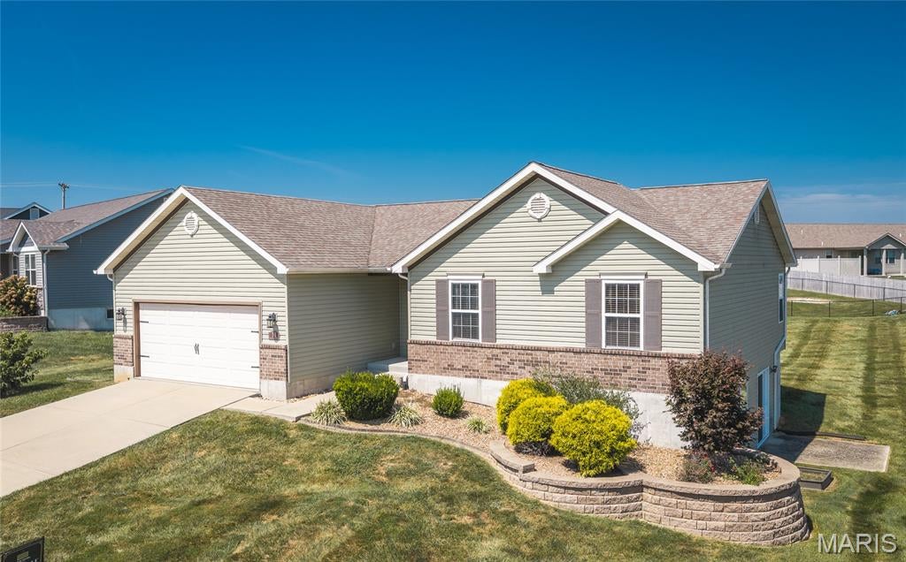 NOW ACTIVE AND AVAILABLE FOR SHOWINGS! Welcome to 31 Keystone Drive in Old Monroe—a well-maintained 3-bedroom, 2-bath home offering approximately 1,418 square feet of comfortable living space. Built in 2014 and situated on a spacious 0.38-acre lot, this property features hardwood flooring, a functional open-concept layout, an attached garage and a partially finished basement providing valuable additional space for recreation, a home office or entertaining. The generous backyard offers plenty of room for gardening, pets, play and outdoor gatherings. With a newer-construction feel, flexible living areas and a desirable Old Monroe location, this move-in-ready home is one you will not want to miss. Schedule your private showing today!