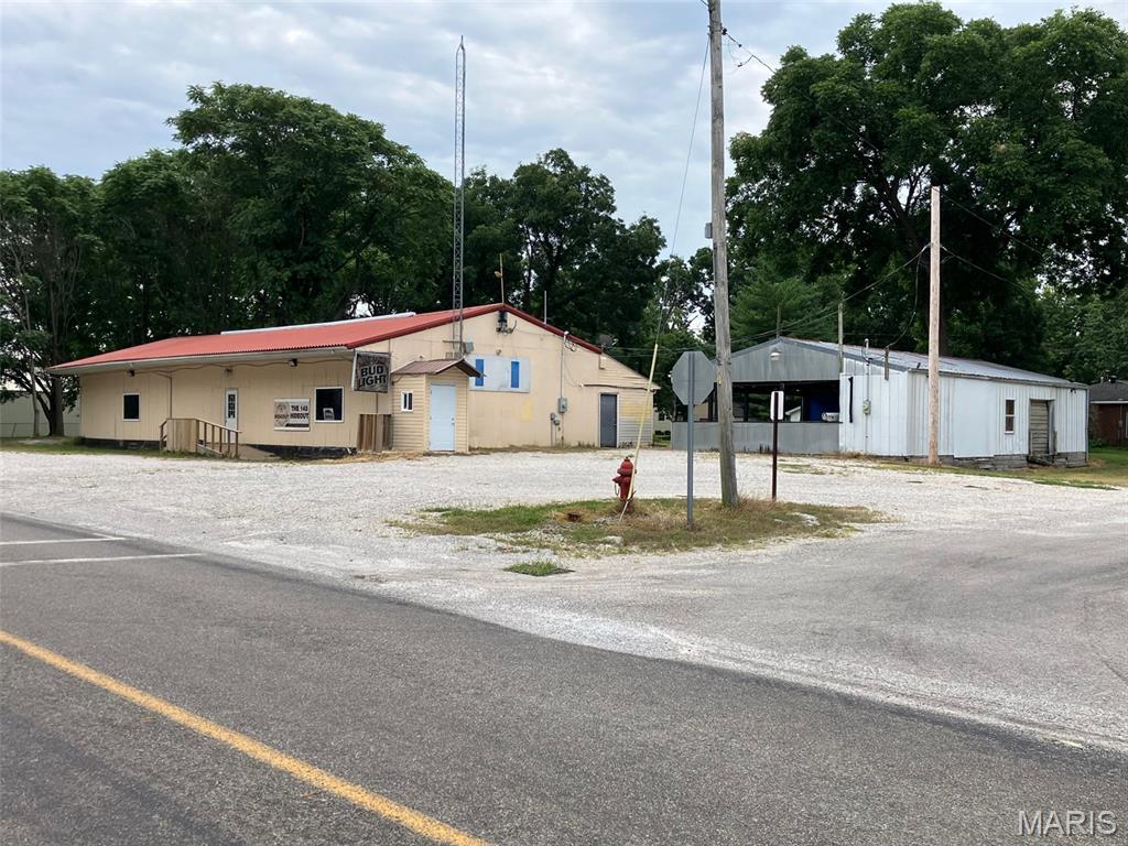 Take advantage of this exceptional opportunity to own a commercial building situated on 0.49 acres (nearly half an acre) in a highly visible location along Illinois State Route 143. With steady daily traffic and excellent accessibility, this property is ideally suited for a bar, restaurant, tavern, or other hospitality venture.

Positioned to attract commuters heading home from work as well as weekend travelers, this location offers outstanding potential to build a loyal customer base. The property's generous lot provides ample room for parking and customer access, while its location and layout also present the opportunity for gaming, providing an additional avenue for revenue, subject to all applicable licensing and local regulations.

Whether you're an experienced operator or an entrepreneur looking for your next investment, this property offers the visibility, convenience, and potential to bring your business vision to life. Don't miss the chance to establish your presence on this nearly half-acre property in this high-traffic corridor.
