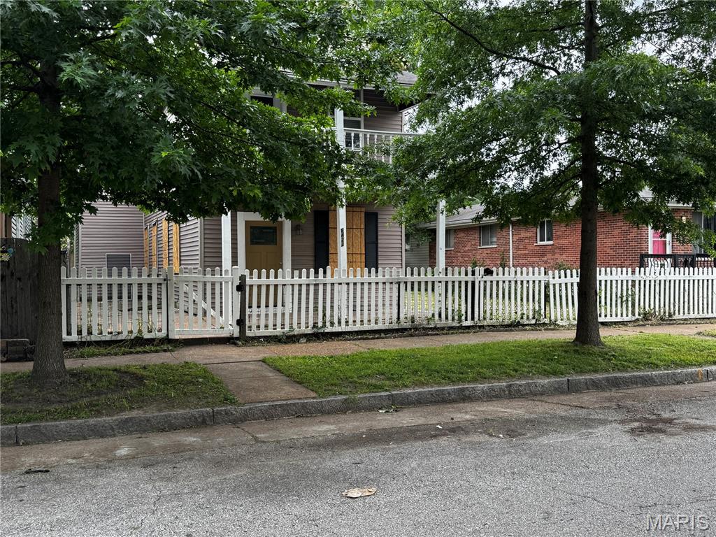Rare St. Louis fixer-upper with undeniable curb appeal, a detached garage, and an oversized double lot — priced to move fast! This stately 3-bedroom, 2-bath, 1,520 sq ft two-story turns heads immediately with two front-facing balconies that deliver the kind of classic architectural character you simply cannot replicate in new construction. This home has soul.


A detached one-car garage adds even more utility and value to an already compelling package — storage, workshop, or future income potential, the options are yours to define.


The real investment thesis lives in the land. Two lots at this price point is an increasingly rare find in St. Louis City — whether your vision is expanded outdoor living, an additional structure, long-term land hold, or a full renovation for rental income, the upside here is genuine and measurable.




Properties with this footprint, this style, and this price don't sit long. Schedule your showing today.