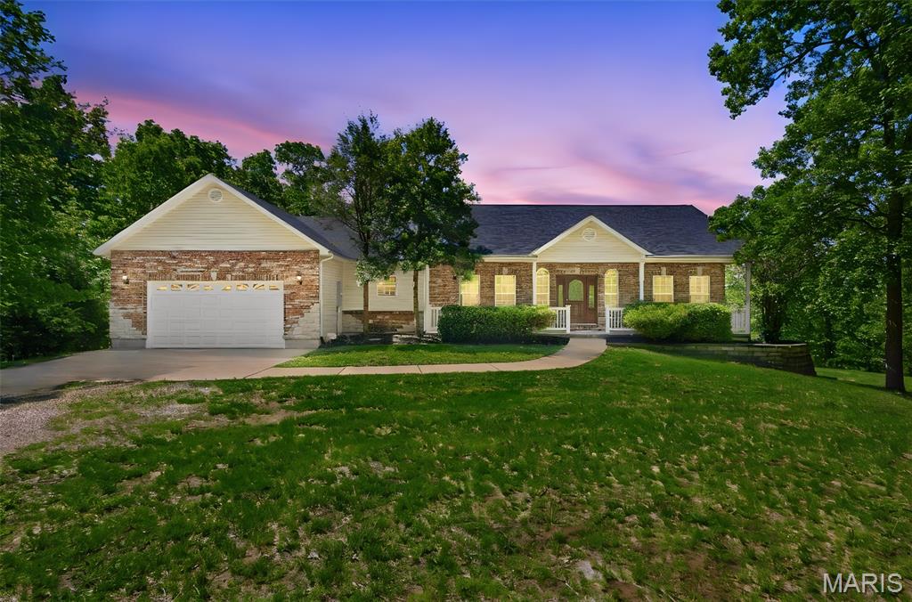 Tucked away on 5 private  acres, this beautifully maintained 4-bedroom, 3-bath home offers the perfect blend of privacy, space, and comfort. Surrounded by serene natural views, the property provides a peaceful retreat while still delivering all the modern conveniences you need.
Inside, you’ll find stunning hardwood floors throughout and a spacious living room anchored by a cozy fireplace—perfect for relaxing evenings at home. The large kitchen is a standout feature, offering abundant counter space and an impressive number of cabinets, making it ideal for cooking, entertaining, and everyday living.
The main-floor laundry room adds convenience, while the partially finished walkout basement provides additional living space with endless possibilities—whether you envision a recreation area, home office, or guest suite.
Step outside onto the expansive deck and take in the beautiful, private surroundings—an ideal spot for morning coffee or evening gatherings.
With generous indoor and outdoor space, privacy, and thoughtful features throughout, this property is a rare find that truly feels like home! 
All appliances, Hot Tub and wood splitter included in sale.