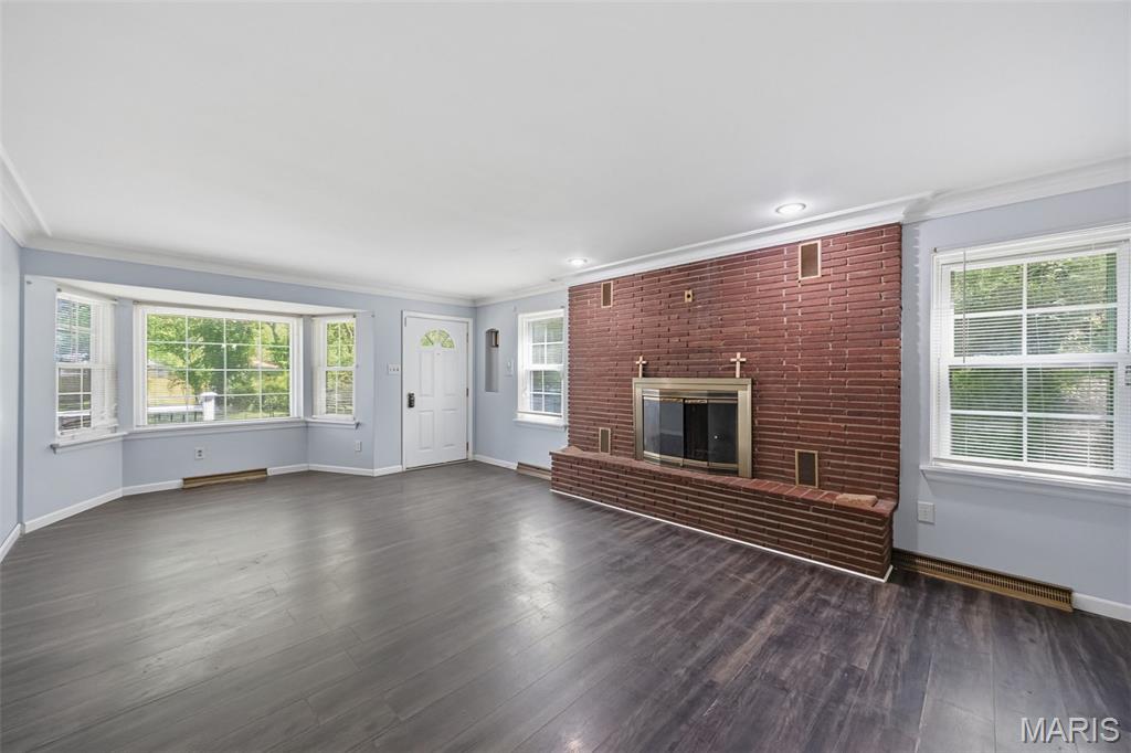 RARE 4-BEDROOM, 3-BATHROOM VALUE UNDER $200K! Tucked away on a quiet, low-traffic cul-de-sac, this expansive multi-level home offers the space, privacy, and versatility you’ve been searching for at an unbeatable price point.

The standout feature? An incredible oversized tandem garage/workshop space—perfect for mechanics, hobbyists, woodworking, or securing extra vehicles and equipment.

Inside, the floor plan is designed for flexible living. The main levels boast bright living spaces, while the private upper-level features a fantastic loft suite that can serve as a massive primary bedroom, a home office, or a teen hangout. With 4 true bedrooms and 3 full bathrooms, morning rush hour is a thing of the past.

The home is solid, clean, and entirely move-in ready—just bring your personal cosmetic touches over time to build instant equity! Located just minutes from the vibrant historic Ferguson downtown district, local breweries, and the famous Saturday Farmers Market.

This much square footage, garage space, and privacy under $200,000 is a rare find in today's market. Schedule your tour before it's gone!