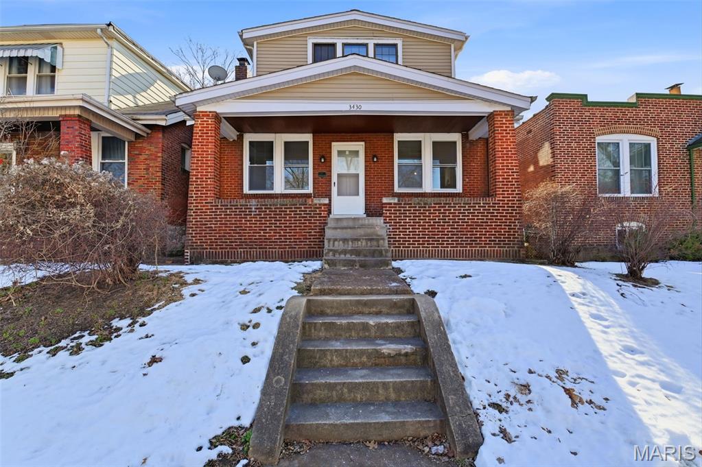 You found it! This 3 bedroom, 3 full bath home has all the character of a classic bungalow: original built-ins, hardwood floors, exposed brick; with the updates you're looking for: new kitchen & professional gas stove, updated bathrooms and remodeled primary suite with soaking tub. Sunny walkout basement and large, covered back porch lead out to a private, level fenced yard and 2-car detached garage. So much charm within walking distance to Tower Grove Park and all the shopping, dining and festivals that define the neighborhood. Priced to sell, don't miss your chance!