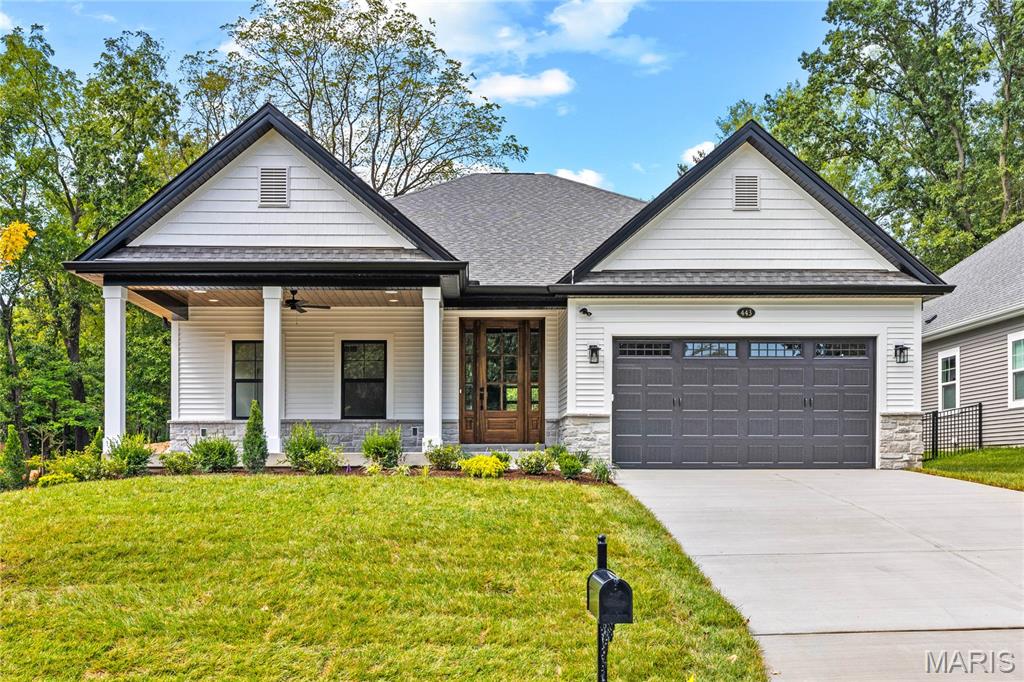 Another SOLD Pentrex Development home, and they hit the ball out of the park again... BLACKBURN PARK this time! This home that is UNDER CONSTRUCTION has the best of both worlds, with an incredibly manageable yard, with its own private gate opening to 36 MORE ACRES of tennis and PICKLEBALL COURTS, ball fields, pavilions, playgrounds, walking paths, and a bird sanctuary! But the incredible craftsmanship of this BRAND NEW construction is the real MVP, with each detail more beautiful than the last. From the welcoming COVERED FRONT PORCH, with stained wood ceiling and ceiling fan, through the stately MAHOGANY entry door, you will find high ceilings, DELUXE moulding, and durable HARDWOOD throughout all the main areas. A full wall of windows, with TRANSOMS above, provide a picturesque PARK VIEW, with a gazebo straight out of the movies. Whether cozying up to the fireplace on a snowy evening, or entertaining all of your favorite people at the 11' Kitchen ISLAND, it's the perfect backdrop. Wet bar with beverage center, gorgeous backsplashes, custom backlit cabinetry, walk-in pantry and an abundance of countertop space create the perfect environment for absolutely any moment. CARPET FREE LIVING extends to the Lower Level where a huge Rec Area, 2 additional bedrooms, an EXERCISE Room and a full bath finish the home. You will not want for anything when you choose this house as your next home. Completed in September 2026. Entered for comp purposes only.