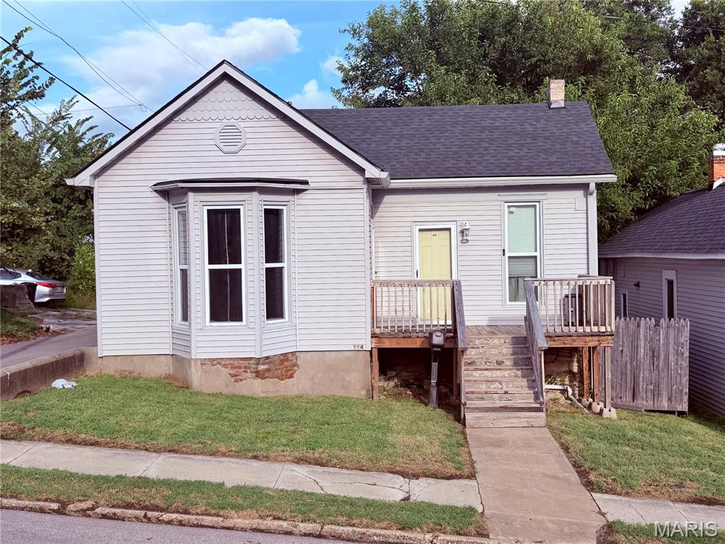 Welcome to 114 S. Arch Street! Remodeled in 2023, this affordable, move-in-ready home offers two bedrooms and one bathroom. The eat-in kitchen features plentiful counter space and a pantry, luxury vinyl plank flooring flows throughout the home. The bathroom includes a sliding barn door, a tub-and-shower combination, and a newer sink vanity. Outside, you’ll find a fenced yard, wood deck, concrete patio, storage shed, and convenient alley access. Updates completed in 2023 include replacement windows, updated electrical, PEX water lines, new ductwork, and new lighting. A partial basement provides additional storage. Whether you’re searching for your first home or your next investment property, this well-maintained home is ready for its new owner.