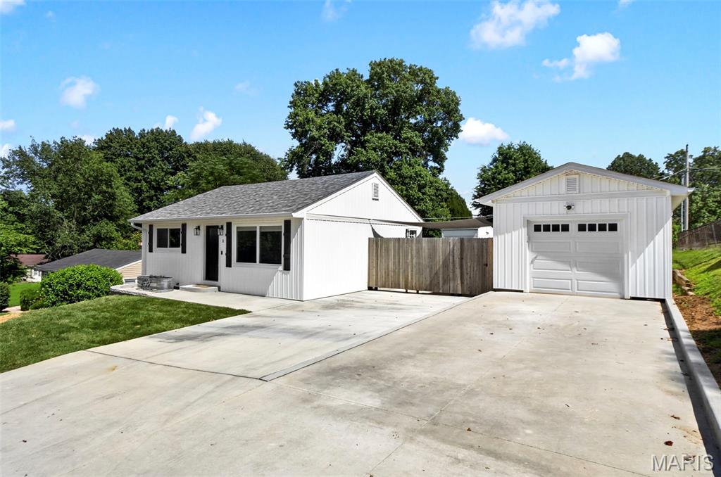 Completely renovated and move-in ready, this stylish ranch offers the perfect blend of modern finishes and functional living space. The main level features 2 spacious bedrooms, an updated full bath, and an open-concept living room highlighted by a striking wood accent wall, exposed beam, and abundant natural light. The beautifully updated kitchen flows seamlessly into the living area, making it ideal for everyday living and entertaining. The finished lower level adds exceptional versatility with an additional third bedroom, perfect for guests, a home office, or workout space, along with plenty of storage and unfinished utility space.
Recent updates include luxury flooring, fresh paint, updated lighting, newer windows, modern fixtures, and refreshed mechanicals. Outside, enjoy a large, level backyard, oversized detached garage, new concrete patio, and plenty of room for outdoor entertaining.
Conveniently located near parks, shopping, restaurants, schools, and major highways, this turnkey home offers modern comfort in the heart of St. Charles. Don't miss your opportunity to make 11 Robin Drive your new home!
