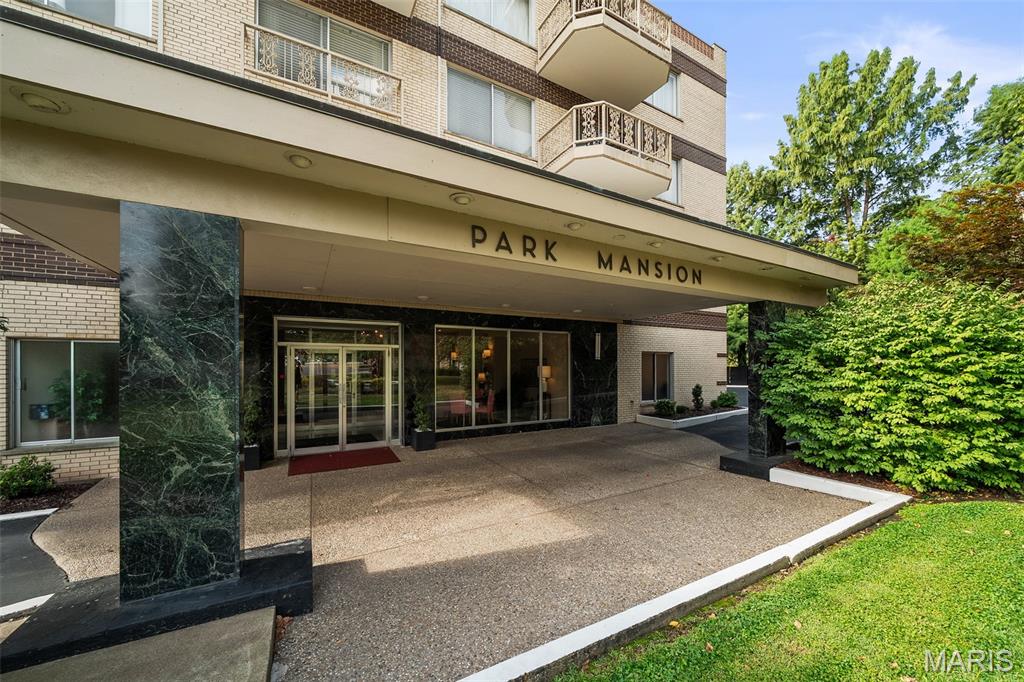 Welcome to the Park Mansion! An architectural masterpiece offering a rare opportunity to own a sophisticated, art deco revival condominium in the highly sought after St. Louis Hills neighborhood. The exquisite corner unit seamlessly blends mid-century glamour with modern luxury, boasting breathtaking views of Willmore Park right from your private terrace. Inside, natural light illuminates a grand, open floor plan showcasing the immaculate parquet flooring and soaring windows. The sunny, eat-in kitchen is a tasteful culinary haven that has been meticulously updated. The serene primary suite features a dedicated dressing area, five expansive closets (including a walk-in), and an updated full bath. The spacious second bedroom includes two closets and custom built-ins, with a full hall bath just outside. This unit includes: 1 secure garage parking space, an additional 2 storage spaces, and laundry facilities on ea floor.  Not to mention all the elite building amenities for you to enjoy, such as : the secure elegant lobby, elevator, fitness room and an exclusive rooftop deck with amazing views and a BBQ area. This is city living at its finest! (no pets or rentals allowed).