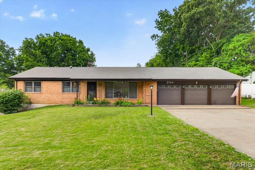 Unlock the potential in this original-owner, all-brick ranch situated on a generous corner lot in South County. Offering nearly 1,900 square feet of main-level living space, this 4-bedroom, 2.5-bath home is an excellent sweat equity opportunity with solid bones, an exceptional floor plan, and room to make it your own.

Inside, you'll find spacious living areas, some hardwood flooring, a fireplace, and a private primary suite with its own bath. The desirable ranch layout offers comfortable everyday living, while the full walkout basement provides a blank canvas for future finishing, storage, workshop space, or additional recreation areas.

A rare 3-car garage adds tremendous value and flexibility, and a few key updates have already been completed, including a brand-new roof (2026) and newer windows (2021). Whether you're looking to renovate, customize, or invest in a property with long-term potential, the opportunities here are undeniable.

Conveniently located near parks, shopping, restaurants, and within the Mehlville School District, 2704 Lido Lane offers the chance to create something special in an established neighborhood.

Property is being sold AS IS.