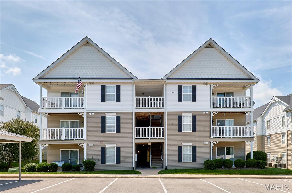 PRICE DROP!!! You won't want to miss this IMMACULATE, MOVE-IN READY 2 Bedroom/2 Bath GROUND LEVEL  (NO STEPS!!!) condo located in the highly desirable community of Springhurst Terrace Condos. Wonderful location offers easy highway access to I-40/64, Hwy N & I-364 as well as as well as nearby Lake St. Louis shopping, dining & entertainment venues. This spacious condo is light & bright featuring an open floor plan blending the breakfast room, living room and kitchen into one large space, perfect for entertaining.  Step out onto the private covered patio to enjoy your morning coffee or just relax in the evenings in a peaceful outdoor setting (includes additional storage closet).  The stylish kitchen features lots of counter space, breakfast bar, backsplash & an abundance of maple cabinetry.  Appliances include an electric range, microwave, dishwasher, garbage disposal & refrigerator. The primary bedroom suite is generous in size & adjoins a private full bath featuring a dual vanity, tub/shower enclosure & large walk-in closet. The 2nd bedroom is also generous in size w/large closet. A 2nd full bath & main floor laundry (Washer/Dryer to remain) just off the hallway complete the many amenities of this beautiful condo. Community amenities include a neighborhood pool, playground, sport court, ponds, dog park, sidewalks & more! Washer & dryer will remain w/property. Newer Hot Water Heater 2024. There is a 1 car carport w/assigned parking right in front. Wentzville Schools. HOA fee includes water, sewer, trash, snow removal. Don't miss this GEM! Schedule your showing appointment today!