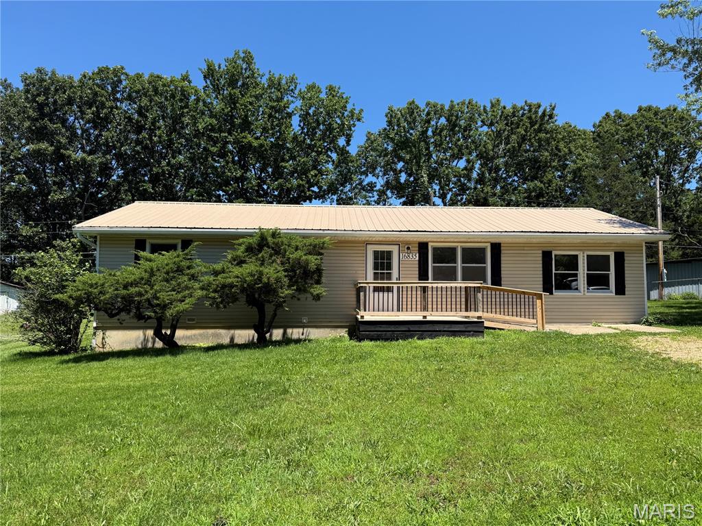 Beautifully updated 4-bedroom, 2-bath home located at 16835 Lakewood Drive in Newburg, MO. This inviting property features a charming wood front porch, perfect for relaxing mornings, and a large concrete back patio ideal for entertaining or enjoying the peaceful surroundings. Nestled on a wood-lined lot, the home offers both privacy and a scenic setting.

Inside, you’ll find modern updates throughout, including luxury vinyl flooring, stylish butcher block countertops, and a sleek tile backsplash that adds warmth and character to the kitchen. Spacious living areas and thoughtful finishes create a comfortable and functional layout for everyday living.

Major improvements include a roof installed less than 5 years ago and an HVAC system less than 3 years old, offering added peace of mind and efficiency for the next owner. This home is the perfect blend of modern style, comfort, and quiet country living.
