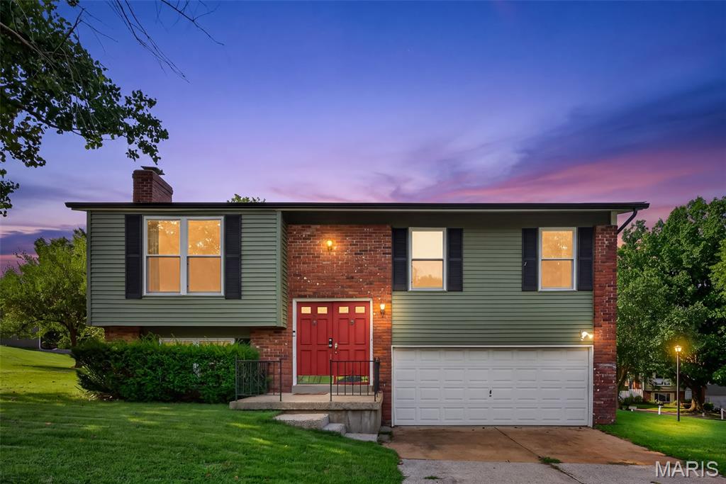 Home being sold AS IS.  RUN, don't walk to get your offer in on this great house at a fabulous price!  Located in a quiet neighborhood, this home is waiting for someone to make it their own.  3 bedrooms, 1 1/2 baths. .  UPDATES INCLUDE: Roof - 2025, Windows - 2025, Siding - 2025, A/C exterior - 2021, Fridge & Range - 2023.  Split level with fireplace in lower level along with a bar, laundry facilities, and half bath.  Upstairs has an eat in kitchen with a breakfast room, counter/bar, pantry, and plenty of cabinets.  Spacious bedrooms, bathroom with separated toilet/tub area.  Home has a  2 Car attached garage and a nice sized yard.