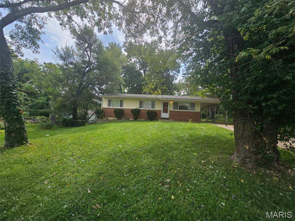 Welcome to this 1-story home offering 1,080 sq ft, 3 bedrooms, 2 bathrooms, and an attached carport! The functional floor plan offers comfortable living spaces with plenty of potential to add your own updates and personal touches. Enjoy a spacious yard with room for outdoor enjoyment. Sold as is. Schedule your showing today!