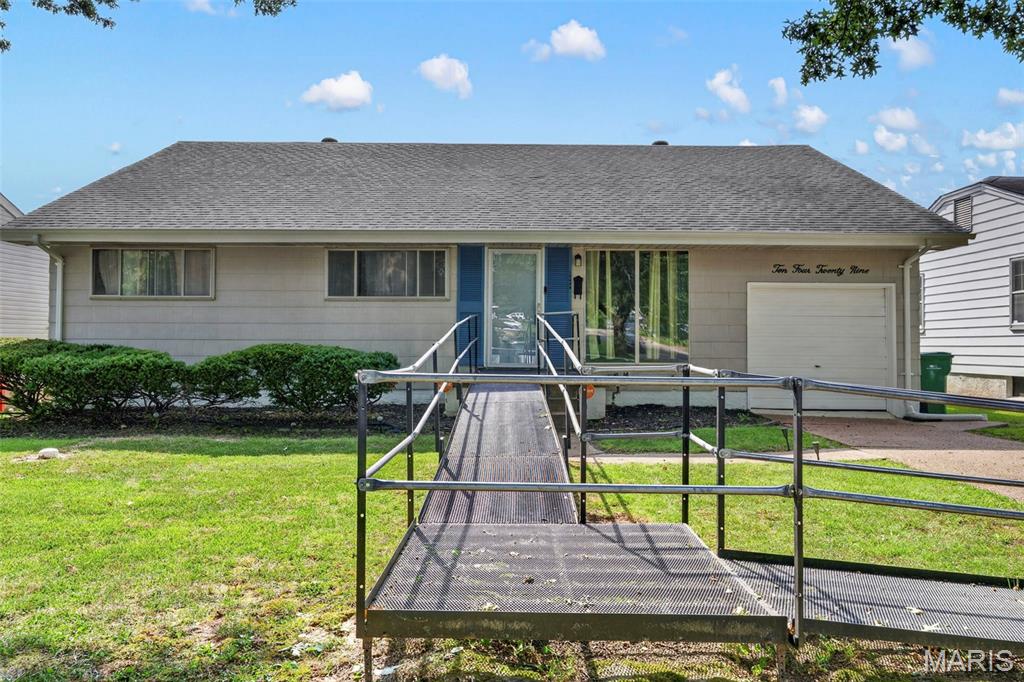 Welcome to this spacious 4 bedroom, 2 bathroom home, nestled in the quiet community of Bellefontaine Neighbors. This home features a separate living room and dining room that leads into a large, open kitchen and family area. 3 bedrooms and 2 bathrooms are available on the main level. The 2nd floor offers a 4th bedroom and an office area. An elevated deck in the backyard is perfect for barbecues and sunsets. The unfinished basement gives plenty of room for expansions and storage. Don't miss your opportunity to own a great home. ***Ramp can be removed upon closing***