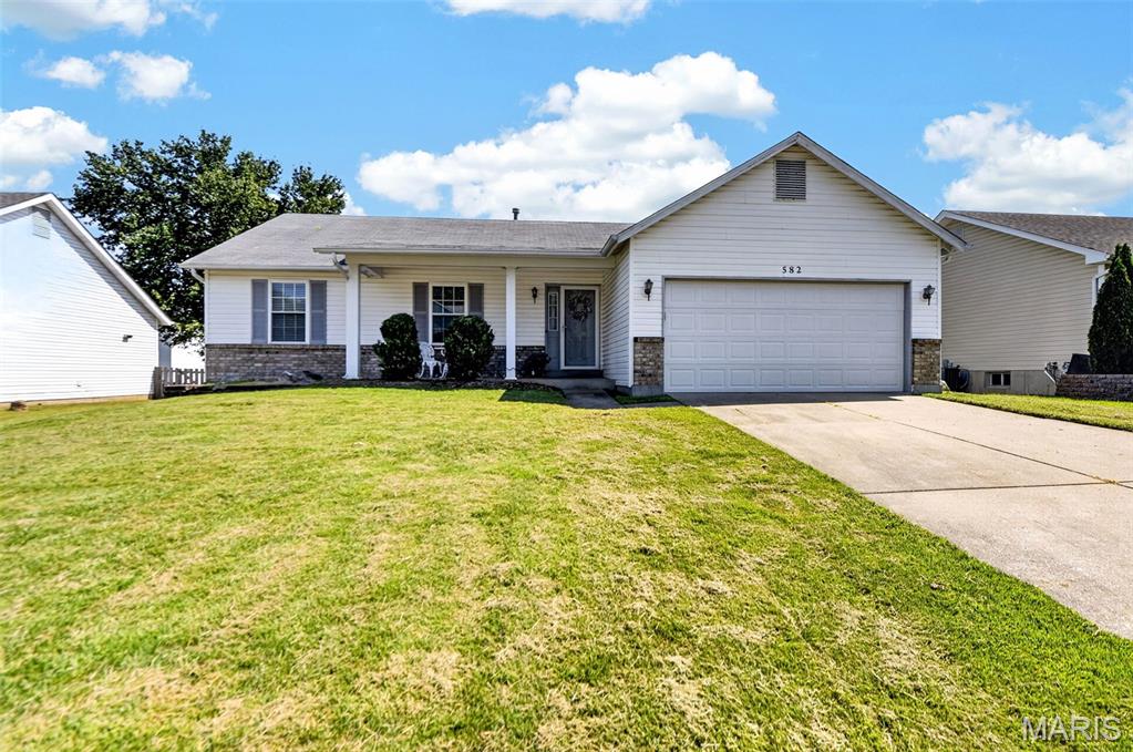 New Home. New Beginnings. New Memories!

Welcome home to this lovely ranch offering approximately 1,438 sq. ft. of above-grade living space, featuring 3 bedrooms, 2 full baths, a large family room, spacious kitchen/breakfast room, partially finished lower level, and an attached 2-car garage.

Step inside and you'll immediately appreciate the fresh, move-in-ready feel. The entire main floor has been freshly painted, including the stairs to the lower level, with the ceilings in the vaulted family room and kitchen also refreshed. All three bedrooms feature brand-new carpeting installed in 2026, as well as ample closet space and ceiling fans with light kits.

The spacious kitchen offers plenty of cabinetry, a designated pantry, electric smooth-top oven/range, dishwasher, and stainless-steel refrigerator. Convenient access to the attached garage makes unloading groceries quick and easy. The adjoining breakfast room is filled with natural light from a large bay window overlooking the backyard.

Gather with family and friends in the generously sized family room, which flows seamlessly to the rear yard and spacious deck—perfect for morning coffee, summer barbecues, entertaining, or simply relaxing at home. The fully fenced backyard provides plenty of room for kids, pets, playtime, and outdoor enjoyment.

The massive primary suite offers the privacy and space you've been looking for, complete with a private en-suite full bath and two closets, giving everyone room to organize their belongings without compromise.

Downstairs, the partially finished lower level provides a huge recreation area and an additional space that could be used as a sleeping area, home office, playroom, or hobby space. You'll also find more than ample storage, giving you plenty of room for seasonal items and everything else you want tucked away.

And then there's the location! Enjoy the convenience of being close to just about everything while still feeling tucked away from the hustle and bustle. Restaurants, Home Depot, Lowe's, multiple grocery stores, libraries, Westoff Park, Fort Zumwalt Park, Page Extension, and Highway 70 are all easily accessible, making commuting, errands, recreation, and everyday living a breeze.

Don't miss your opportunity to make this well-maintained, freshly updated ranch your new home and start creating memories of your own!