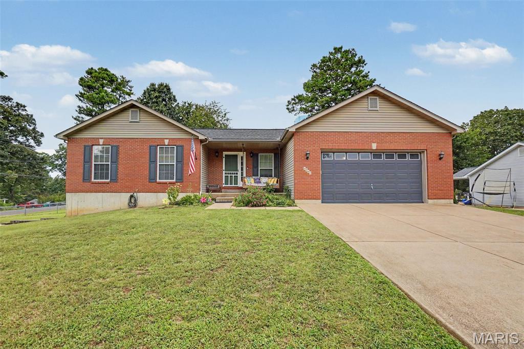 Welcome home! This beautiful ranch has the kind of space, flexibility, and setting that makes you want to slow down and stay awhile. Sitting on a sprawling half-acre lot, this home offers room to spread out both inside and out, with an additional driveway, ample parking, and a truly unique walkout basement workshop with double doors and direct driveway access.

Step inside and you’re immediately welcomed by an open, inviting layout centered around a warm, working gas fireplace. Vaulted ceilings give the main living area an airy feel, while the open design keeps everyone connected whether you’re relaxing on the couch, gathering around the kitchen, or entertaining friends. The main floor laundry adds everyday convenience, and just beyond the living space, the walkout leads to a covered back patio overlooking the backyard—an easy spot to enjoy a morning coffee, fire up the grill, or settle in for a quiet evening.

Outside, the half-acre lot gives you room to make the most of your space. The backyard is ready for everything from weekend gatherings to a little room to roam, while the large storage shed on its own poured-concrete pad provides a practical place to keep lawn equipment, tools, and outdoor gear tucked away.

The main floor continues with two generously sized secondary bedrooms and an impressive primary suite complete with a private en suite bath. There’s plenty of room here to settle in comfortably while still having space for whatever comes next.

And then there’s the basement—where this home really sets itself apart. Imagine turning on the projector, settling into the media room, and making movie night a regular event. A convenient half bath is nearby, along with a full bonus room featuring a large closet that offers plenty of possibilities for hobbies, guests, an office, a workout space, or whatever fits your needs.

On the opposite side of the basement, the driveway-fed workshop is a rare find. With double doors and enough room to bring in extra equipment, vehicles, recreational gear, or just about any project you’ve been waiting for the right space to tackle, this is the kind of feature that’s difficult to recreate.

Whether you’re looking for a home with room to grow, space for your hobbies, a backyard worth enjoying, or simply a place where everyday life feels a little more comfortable, this one delivers. Located in a highly desirable and growing area, this is more than just a house with a great floor plan—it’s a home with the flexibility to fit the way you live today and the possibilities of tomorrow.

Come see it for yourself. You may just find the space you’ve been looking for.