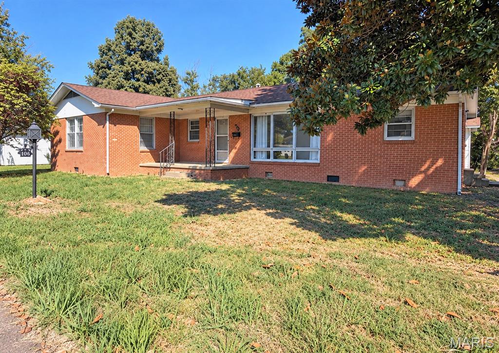 Welcome home to this nice 3-bedroom, 2-bath brick home offering 1,720 square feet of living space in a desirable, convenient location near schools. Inside, you’ll find a large living room, and a spacious dining room that could easily serve as a bonus room, family rm., office, or any additional space to fit your needs.

Outside, enjoy the covered front porch, detached garage, and convenient side-alley access providing easy access to the garage and additional parking. With generous living space, a flexible floor plan, solid brick exterior, and a great location, this home has plenty to offer its next owner!