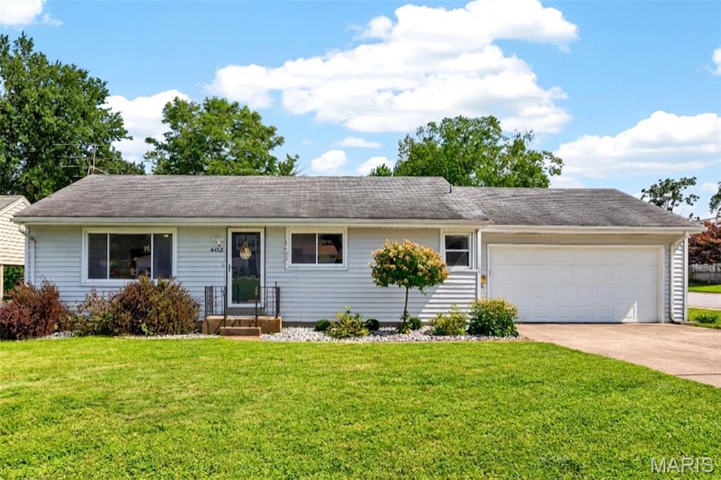 Fire up the grill, hang out on the screened porch, throw open the windows, and settle in. This updated, open-concept ranch was built for good weekends and easy hosting. Step through the front door into a wide-open main level where the living room, dining area, and kitchen share one bright, connected space. A big picture window pulls natural light across the whole floor, and there is room to spread out whether you are hosting a crowd or having a quiet night in. The kitchen anchors it all with white shaker cabinets, granite counters, a granite breakfast bar, and stainless steel appliances. The refrigerator stays with the home.
Down the hall are three bedrooms ready to adapt to whatever life brings, whether that's a nursery, a guest room, a roommate, or a home office overlooking the backyard. The full bath is updated with a granite vanity and vessel sink. Neutral paint and ceiling fans run throughout. The lower level is spacious and clean. It is partially finished, already has a bathroom, and offers plenty of room for a game room, home gym, or hangout space, plus dedicated storage. Out back is a screened porch and fenced corner-lot yard. The oversized two-car garage and long driveway handle parking with room to spare. Neighborhood shops and schools are within walking distance, Historic Main Street St. Charles is minutes away for dinner, drinks, and breweries, and I-70, Highway 370, and Highway 364 are a quick hop from there. Yes, the floors have seen better days, and we are not going to pretend otherwise. That is exactly why the seller is offering a $3,500 flooring credit, so you can upgrade as you wish. Recent updates include: ROOF (2020), HVAC SYSTEM (2020), updated kitchen, updated bathroom, and a new front door. Schedule your showing today!