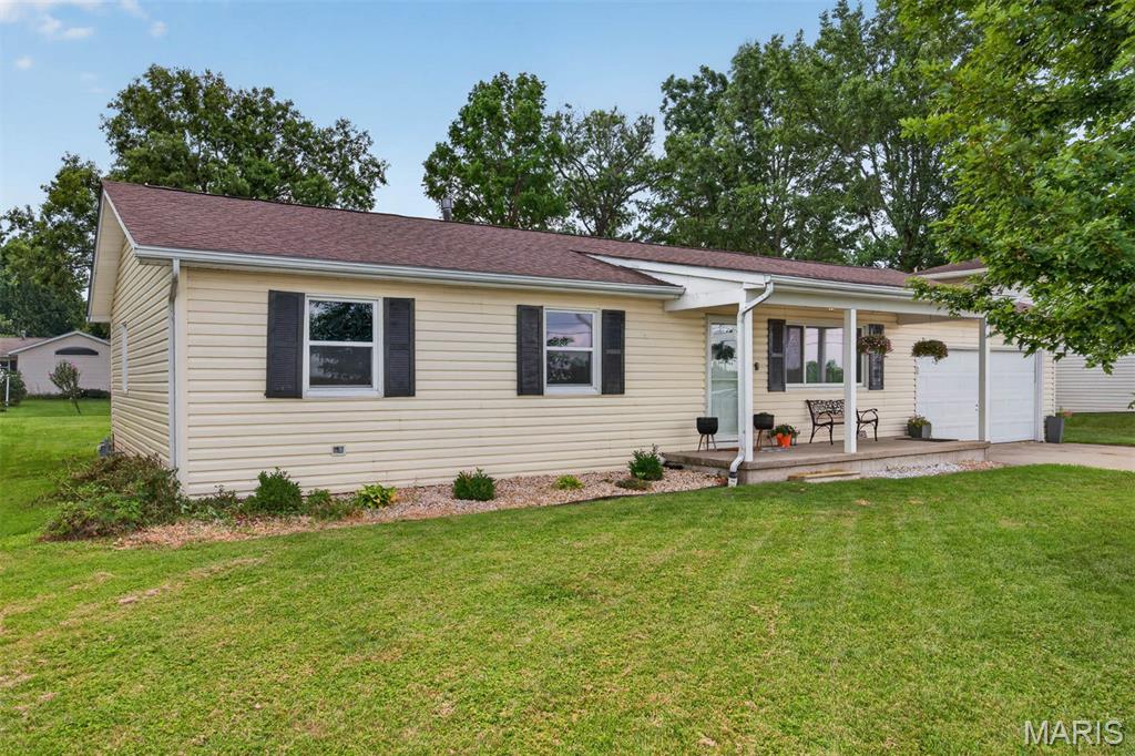 Showings start on Friday at 5  ( OPEN HOUSE Friday 5 to 7) Beautifully updated and move-in ready! This 3-bedroom, 2-bath home was completely remodeled just two years ago and offers the perfect blend of modern style and everyday comfort. The stunning kitchen features white cabinetry, stainless steel appliances, and a spacious eat-in dining area that's ideal for family meals and entertaining. A large living room provides plenty of space to relax, while the updated bathrooms, new flooring, and contemporary lighting add a fresh, stylish feel throughout the home. A separate laundry room offers added convenience, and the attached 2-car garage provides ample storage. Step outside to the large patio overlooking the spacious backyard—perfect for grilling, entertaining, or simply enjoying the outdoors. With all the major updates already completed, this home is truly move-in ready and waiting for its new owners!