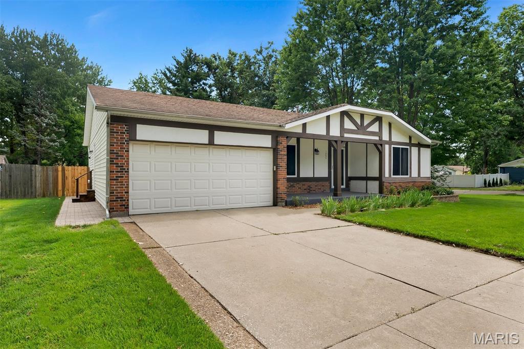 Beautifully updated 1,594 sq. ft. 3-bedroom, 2-bath ranch offering comfortable living space and plenty of room to grow. The home features a large, level, fully fenced yard with a 6-foot wood privacy fence, a spacious low maintenance deck, and a covered front porch. A 2-car front-entry garage provides convenient parking and storage.

The exterior has been freshly painted and features vinyl thermal windows throughout, along with French doors with built-in blinds leading to the deck. The gourmet kitchen boasts maple cabinetry, a breakfast bar, stainless steel appliances, and ceramic tile flooring.

Each bedroom offers a walk-in closet, while the freshly painted interior includes a welcoming living room with corner fireplace, a separate dining room, and updated laminate flooring. The finished lower level adds even more living space with a recreation room, family room, fitness area, and an additional sleeping area.

This well-maintained home combines thoughtful updates, abundant storage, and versatile living spaces both inside and out.