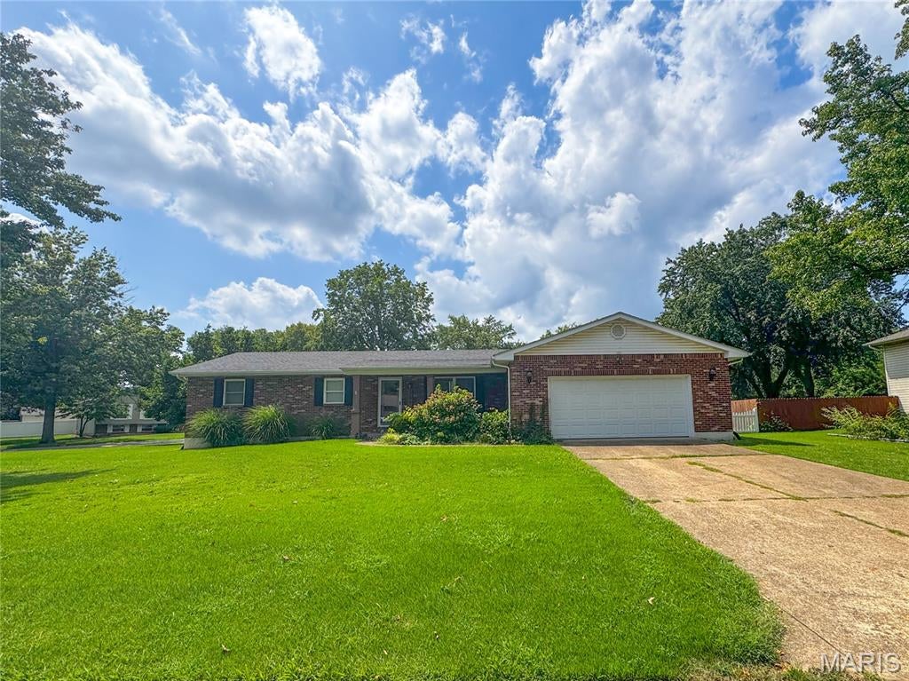 OPEN HOUSE THIS WEEKEND: 8/28 & 8/29. Situated on a spacious corner lot in Holiday Park Subdivision, this 3-bedroom, 2-bath all-brick home offers a great mix of space, character, and recent updates. A new roof will be installed prior to closing! New flooring add a fresh touch, while multiple living areas provide added flexibility for everyday living and entertaining. The home features a comfortable living room, a separate family room with a fireplace, and a full basement offering additional storage or future possibilities. Out back, the covered deck creates a great spot for relaxing or entertaining. With solid brick construction, a functional layout, and key improvements already completed, this home is ready for its next chapter.