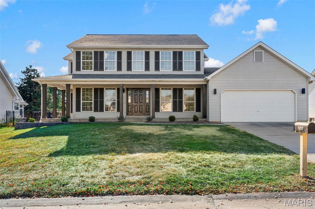 Some houses are updated just enough to look good in pictures. This is absolutely not one of them.

1217 Summer Lynne Drive is a 4 bedroom, 2 1/2 bath, two-story home located in the Wentzville School District that has been renovated throughout and is truly ready for someone to move in without immediately making a list of projects. The main level has new LVP flooring, a comfortable living room, a dedicated office, a completely updated half bathroom, and a floor plan that feels open and connected without turning the entire house into one big room.

The kitchen is where this home really stands out. There are quartz countertops, stainless steel appliances with a gas range, an oversized island with plenty of room for seating, a tile backsplash, and more than enough space to cook, entertain, or gather around while someone else does the cooking. The dining area gets great natural light and has a sliding door that leads directly to the enormous, level backyard. Main-floor laundry is conveniently tucked between the kitchen and garage, exactly where you would want it.

All four bedrooms are upstairs, including the spacious primary suite with a walk-in closet and a bathroom that will make you stop in your tracks and say "woah!" It has a freestanding soaking tub, a custom-tiled walk-in shower, a double vanity, and all-new tile flooring, fixtures, lighting, and finishes. The other full bathroom upstairs has also been completely redone and includes a dual vanity, so the updates do not stop at the primary suite. Even the other three bedrooms have plenty of closet space, with one of them having its own walk-in closet!

The basement is unfinished, but it gives you a large, clean space for storage now and plenty of options if you decide to finish it later. The newly installed dual-zone HVAC system is another major update already taken care of. The home also includes a spacious 2-car garage, and you can’t forget about the neighborhood pool located just a short distance away.

If you have been trying to find a true 4 bedroom home with the expensive work already completed and bathrooms and a kitchen that do not feel like an afterthought, 1217 Summer Lynne Drive deserves to be on your list. Schedule your showing today!