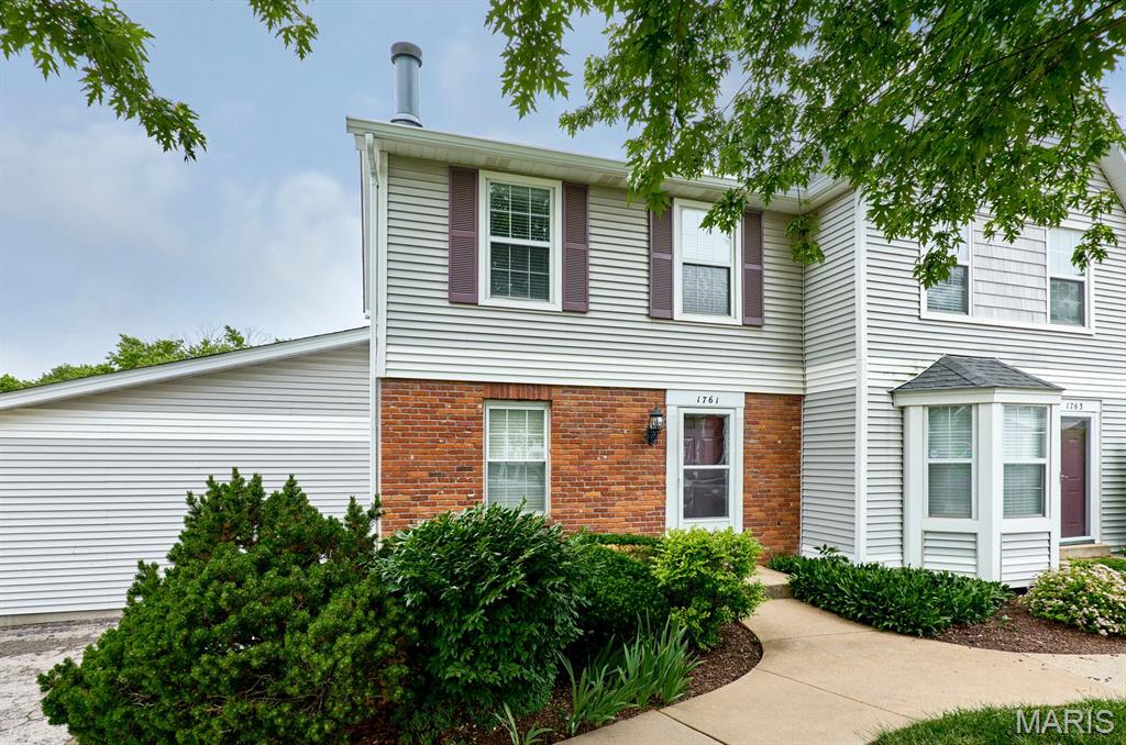 Welcome home to this beautifully updated condo in the highly desirable Heatherton community in St. Charles! Perfectly located just minutes from Highway 364, shopping, hospitals, restaurants, and the airport, this move-in ready 2-bedroom, 2.5-bath home offers convenience and low-maintenance living!  Beautiful new flooring and paint throughout! Inside, you’ll love the cozy living room with fireplace.  Gorgeous kitchen with brand new appliances.  Breakfast area  leads out to the deck-perfect for morning coffee or relaxing after work!  Upstairs, both bedrooms are bright and spacious.  Additional highlights include new light fixtures and ceiling fans, new bathroom sinks and toilets, 1 car attached garage with new opener and extra storage space , walk-out basement with bathroom, and in-unit laundry hookups. Enjoy stress-free condo living with HOA amenities that include exterior maintenance, lawn care, snow removal, water, sewer, trash, and access to the community pool. Stylish updates, fantastic amenities, and an unbeatable location make this condo the perfect place to call home!