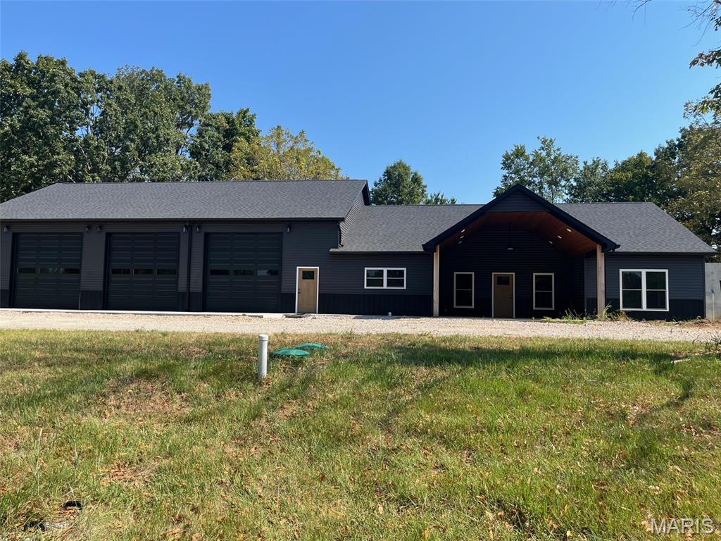 Brand-New Custom Home on 2 Acres with Oversized 3-Car Garage. Welcome to your dream country retreat! This brand-new, custom-built 2,100 sq. ft. home offers the perfect combination of modern luxury, thoughtful design, and peaceful country privacy, all situated on 2 beautiful acres.
Featuring 3 bedrooms and 3 full bathrooms, this home is designed with comfort and quality in mind. The spacious primary suite is a true retreat, featuring a luxurious ceramic-tile walk-in shower, separate soaking tub, private water closet, and a huge walk-in closet with plenty of storage.
The heart of the home is the stunning kitchen, complete with custom cabinetry, granite countertops, and a convenient walk-in pantry. The open living area showcases beautiful vaulted ceilings, creating an inviting and spacious atmosphere perfect for entertaining or relaxing.
Step outside and enjoy the gorgeous vaulted tongue-and-groove porch ceiling, offering the perfect spot to take in the peaceful surroundings and enjoy the privacy of country living.

The property also features an impressive 2,604 sq. ft. oversized 3-car garage, complete with 12-foot garage doors and its own full bathroom. Whether you need room for vehicles, boats, equipment, hobbies, or a workshop, this space provides incredible flexibility.

Additional features include a concrete vault room for added security and storage, a convenient circle driveway, and plenty of land to enjoy.