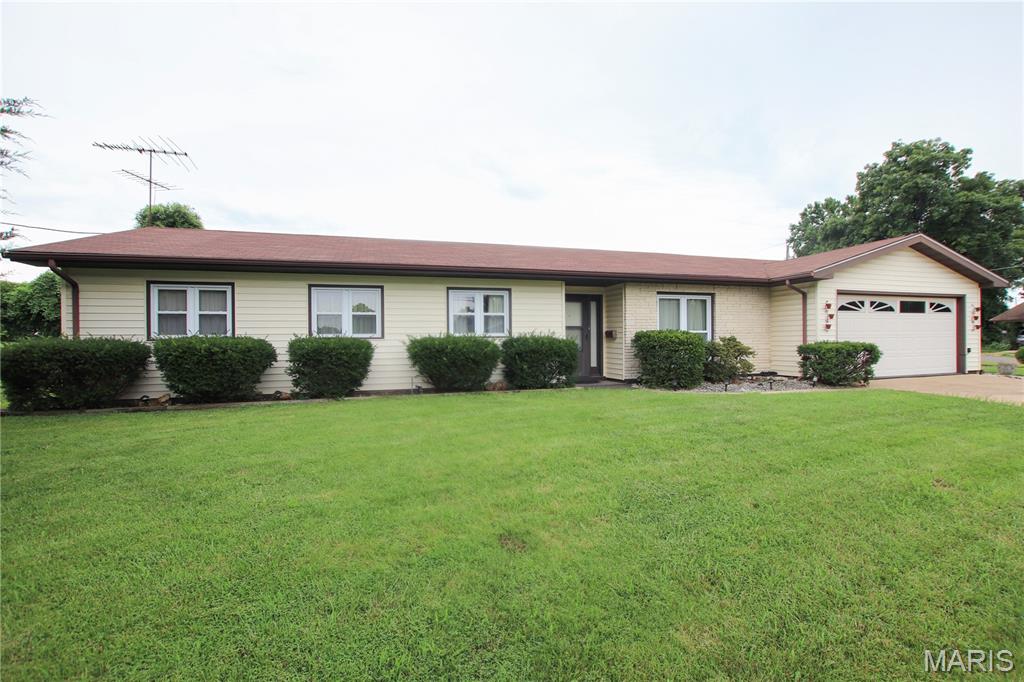 Exceptionally well maintained and move in ready, this generously sized 3 bed 2 bath home sits on a great corner lot. Inside, you’ll find a thoughtful layout with lots of square footage and storage. The kitchen opens to a covered patio, creating a perfect flow for indoor-outdoor living. The master bedroom offers a full bathroom with brand new flooring. You will also find 2 additional bedrooms and a full bath off the hall. There is also a dedicated office space, making working from home a breeze. You will also enjoy ample parking and a fully fenced yard, perfect for outdoor living, entertaining, or pets.  Additional perks include a garage with extra storage, a separate workshop/shed, and a brand new driveway for easy access. 
Recent updates include a new roof (2022), new HVAC system (2023), new overhead lighting, and a new water heater (2023). The home is all-electric. Schedule your showing today!