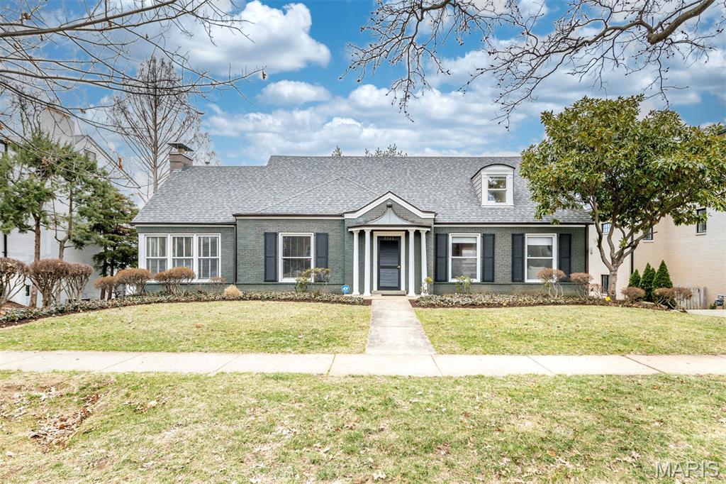 Welcome to 8161 Stratford Dr., a MUST SEE 4 bedroom, 3 full & 2 half bathroom home in the heart of Clayton! This stunning home has an open floor plan with a great flow! This classic layout has a separate dining room to your left upon entering, & on your right is the formal living room. Chef inspired kitchen with custom cabinetry, granite countertops, black appliances, updated fixtures & hardware. The kitchen is open to the breakfast room & family room. Continuing through the main floor, you will find main floor laundry & the primary bedroom suite; here you will find a wood burning fireplace, built-in bookshelves, recessed lighting, & a large walk-in closet. The primary bathroom has dual sinks, a jetted tub, & separate walk-in shower. The second floor has 3 more large bedrooms & 2 full bathrooms. Hardwood flooring throughout the upper & main levels. The mostly finished walkout basement has a large entertaining area, 2 other large finished rooms, & a half bathroom. Outside, the private back yard has an expansive deck, & plenty of green space to relax and enjoy the St. Louis seasons. 2 car tuck-under tandem garage. Washer/dryer, & refrigerator are included in the sale. Dual zoned high efficiency HVAC systems. Highly desired AAA Clayton Schools, close to shopping & restaurants with easy highway access; schedule a showing today!