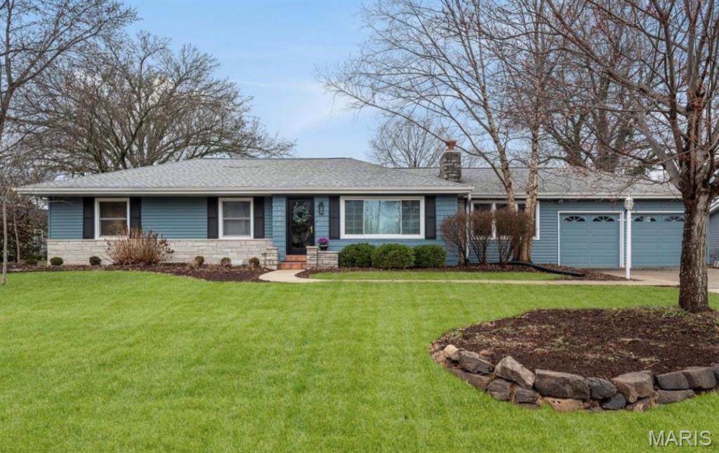 Welcome to this exceptional Des Peres ranch offering the perfect blend of open-concept living, thoughtful design, and everyday comfort. Extensively remodeled and expanded in 2017, this beautifully updated home features hardwood floors, and a seamless flow ideal for both entertaining and relaxed living.

The inviting living room, complete with a fireplace, opens to an expansive dining area and stunning chef's kitchen that serves as the heart of the home. Designed for gathering, the kitchen boasts a large quartz center island, custom cabinetry with glass-front display cabinets, stainless steel appliances including a gas cooktop, double built-in ovens, apron-front sink, refrigerator, dishwasher, and wine refrigerator. The adjacent family room creates an effortless space for hosting family and friends.

The private primary suite is a true retreat, featuring a cathedral ceiling, plantation shutters, a spacious walk-in closet, and a luxurious spa-inspired bath with marble tile, dual marble-topped vanities, and an oversized marble-surround shower. Three additional generously sized bedrooms and two updated full baths are thoughtfully situated in a separate wing, providing comfort and privacy for family members or guests.

Additional highlights include a main-floor laundry and mudroom, two-car garage, unfinished lower level offering abundant storage or future expansion potential, and a large fenced backyard with patio. Recent exterior improvements include extensive landscaping updates and a new roof installed in 2020.

Included with the home are the kitchen refrigerator, wine refrigerator and mounted family room TV. Ideally located within the highly acclaimed Kirkwood School District and just a short walk to Des Peres Park, this home also offers convenient access to shopping, dining, and major thoroughfares. This is one-level living at its finest.