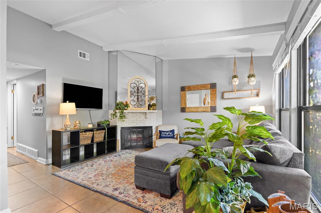 Public Open House on Saturday, June 20th, 1:00 PM-3:00 PM. Welcome home to this beautifully maintained ground-level end-unit condo with a new roof in the heart of South County! Offering 3 bedrooms and 1 bath, this spacious home combines comfort, convenience, and low-maintenance living. Step inside to discover vaulted ceilings with exposed beams, a cozy fireplace, and an abundance of natural light that creates an inviting atmosphere. The desirable end-unit location provides added privacy, while the private back patio and storage shed offer the perfect space to relax and stay organized. Residents enjoy community amenities including an in-ground pool, tennis courts, and ample parking for guests. Conveniently located near major highways, shopping, restaurants, and everyday conveniences, you'll love having everything you need just minutes away. Don't miss your opportunity to own this move-in-ready condo with standout features and an unbeatable location!