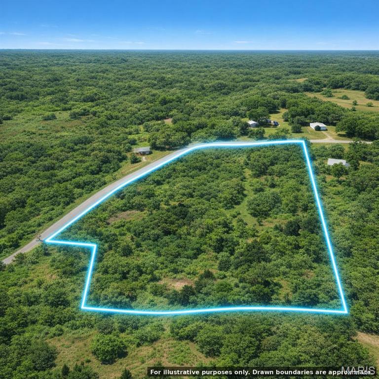 Escape to the perfect blend of privacy and convenience with 9.28± acres comprised of two adjoining wooded parcels located on E Fanny Street in Humansville, MO. Featuring extensive road frontage and a beautiful stand of mature timber, this property offers multiple potential building sites tucked among the trees while remaining just minutes from the amenities of town. Whether you're looking to build your dream home, establish a private retreat, or invest in acreage with future potential, this Polk County property provides the space and flexibility to make your vision a reality. Enjoy the peace of country living with easy access to city conveniences, all within a scenic wooded setting that offers seclusion, wildlife, and natural beauty.

Property Highlights:

~ 9.28± acres in Polk County, Missouri
~ Located on E Fanny Street in Humansville
~ Heavily wooded with mature timber throughout
~ Excellent privacy and natural setting
~ Extensive road frontage for easy access
~ Multiple potential homesite locations
~ Abundant wildlife and recreational opportunities
~ Ideal for a custom home, weekend retreat, or investment property
~ Convenient access to schools, shopping, and local amenities
~ Easy drive to Bolivar and surrounding communities
~ No HOA fees
~ Rare opportunity to own acreage near town while maintaining a country feel

Buyer to verify all information including zoning, utility availability, access, lot dimensions, building requirements, and permitted uses with the appropriate local agencies.